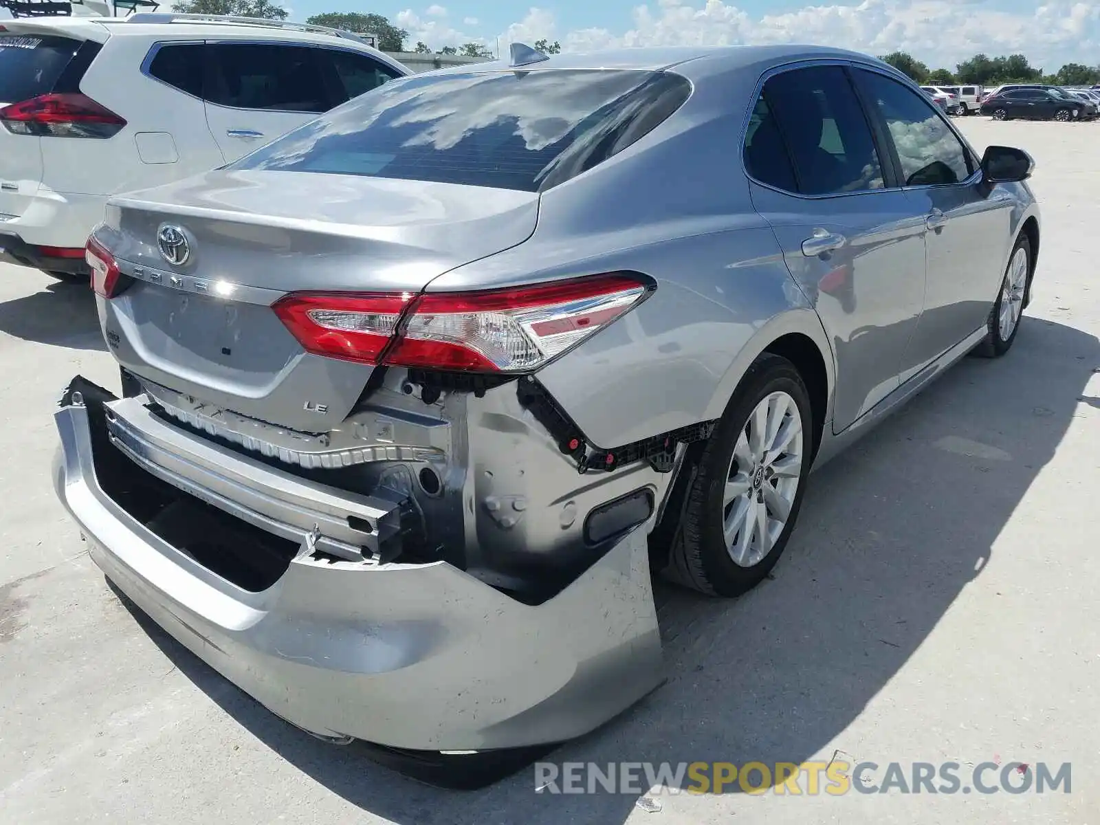 4 Photograph of a damaged car 4T1B11HK7KU715558 TOYOTA CAMRY 2019