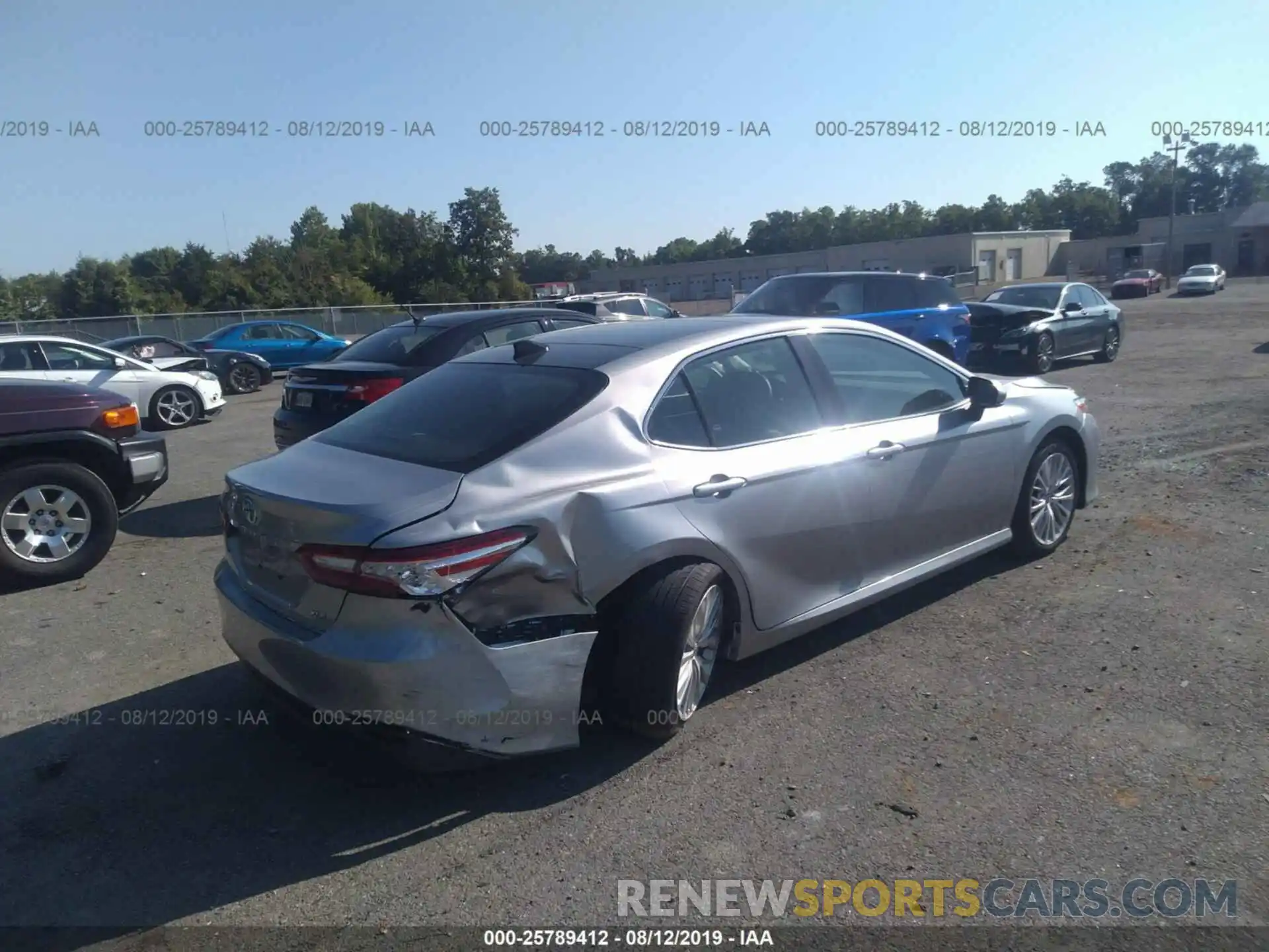 4 Photograph of a damaged car 4T1B11HK7KU716452 TOYOTA CAMRY 2019