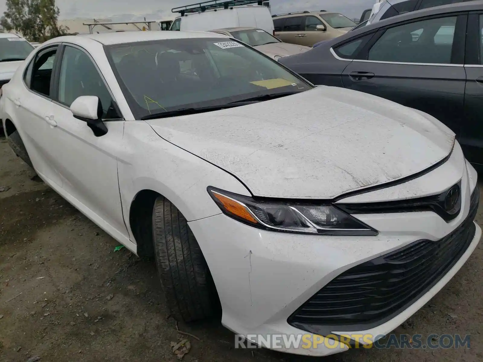 1 Photograph of a damaged car 4T1B11HK7KU718153 TOYOTA CAMRY 2019