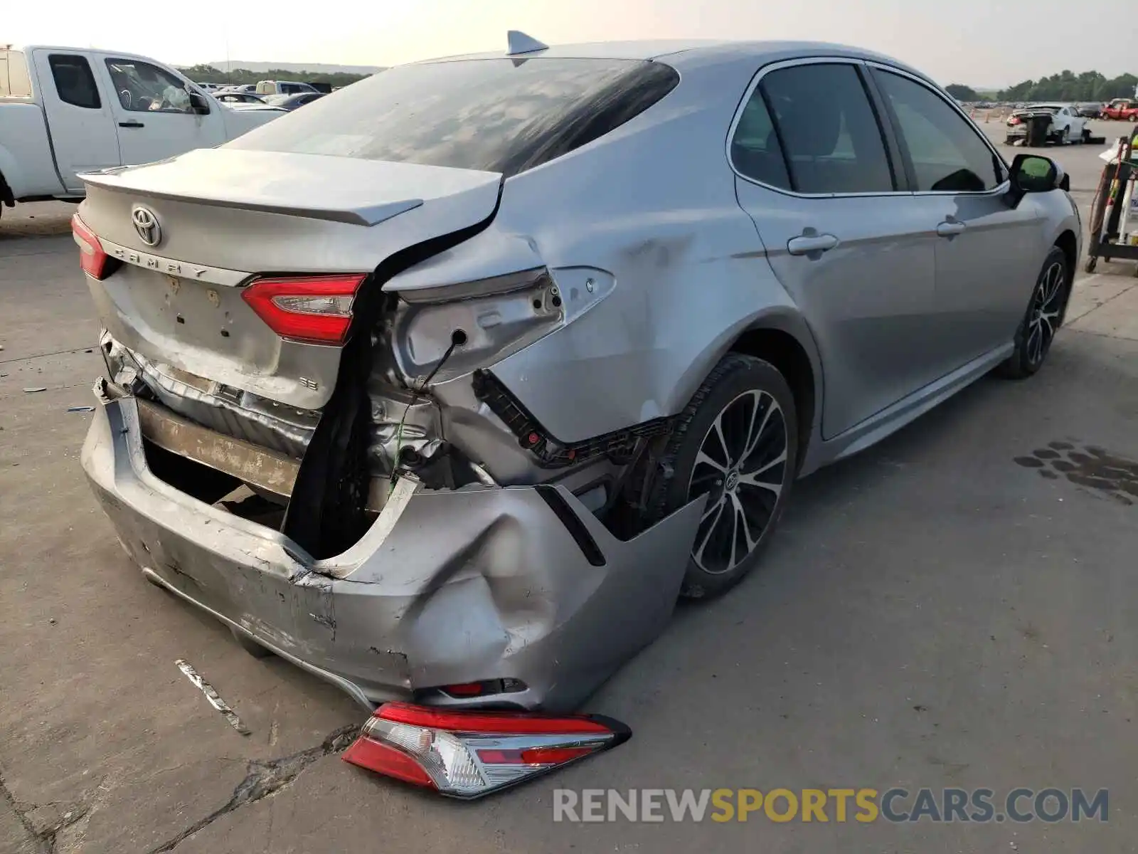 4 Photograph of a damaged car 4T1B11HK7KU724163 TOYOTA CAMRY 2019