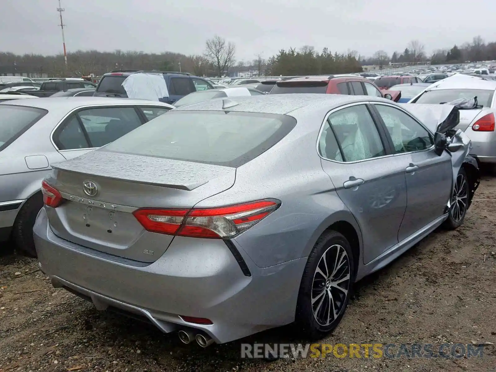 4 Photograph of a damaged car 4T1B11HK7KU725085 TOYOTA CAMRY 2019