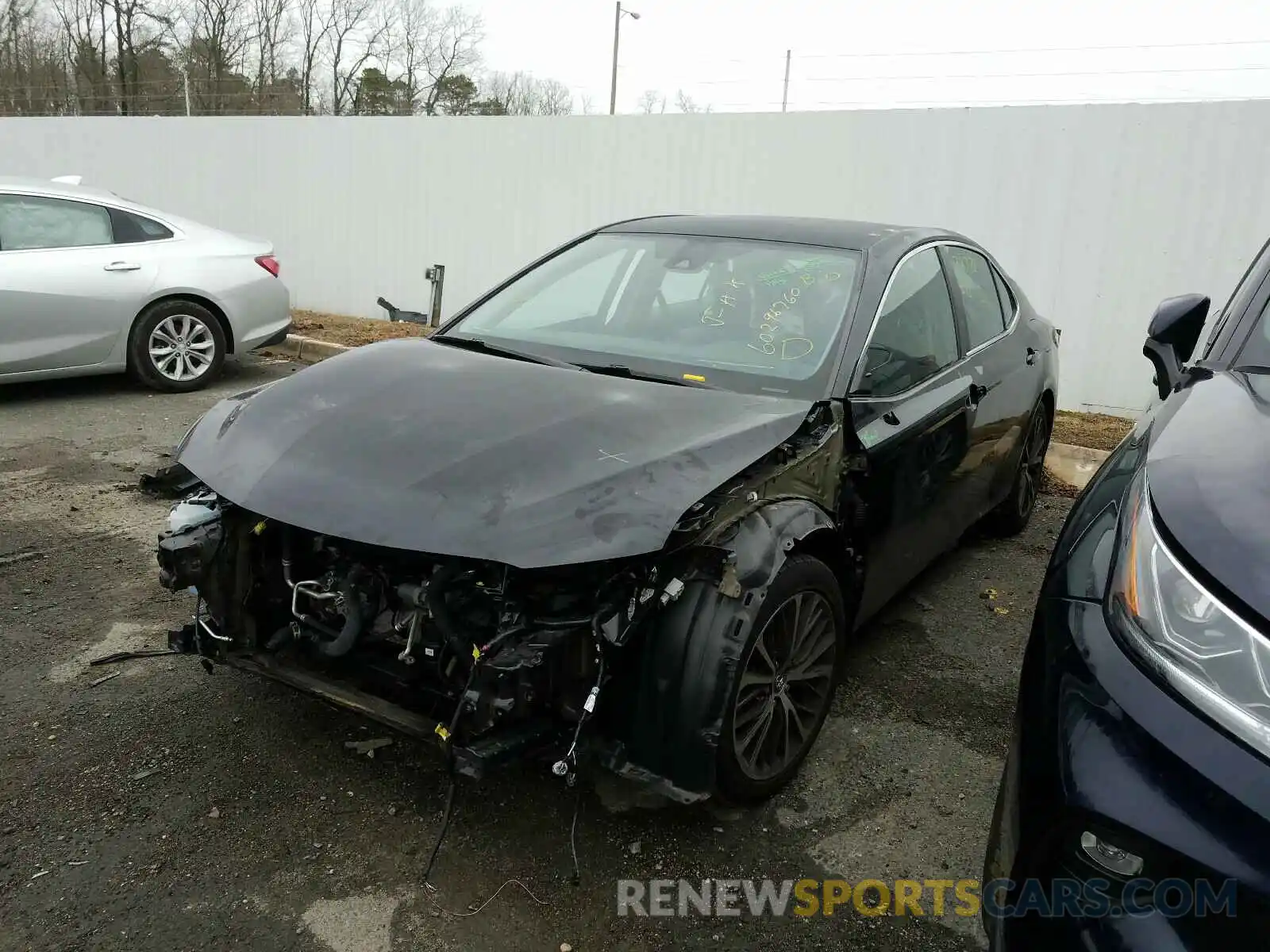 2 Photograph of a damaged car 4T1B11HK7KU727953 TOYOTA CAMRY 2019