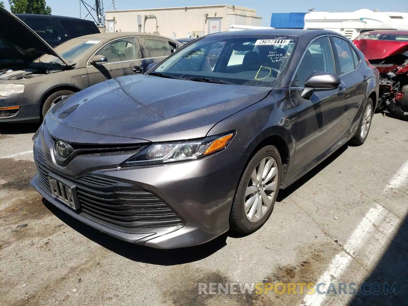 2 Photograph of a damaged car 4T1B11HK7KU729220 TOYOTA CAMRY 2019