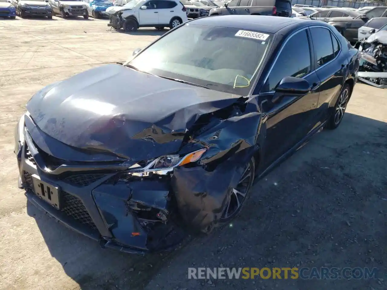 2 Photograph of a damaged car 4T1B11HK7KU729296 TOYOTA CAMRY 2019