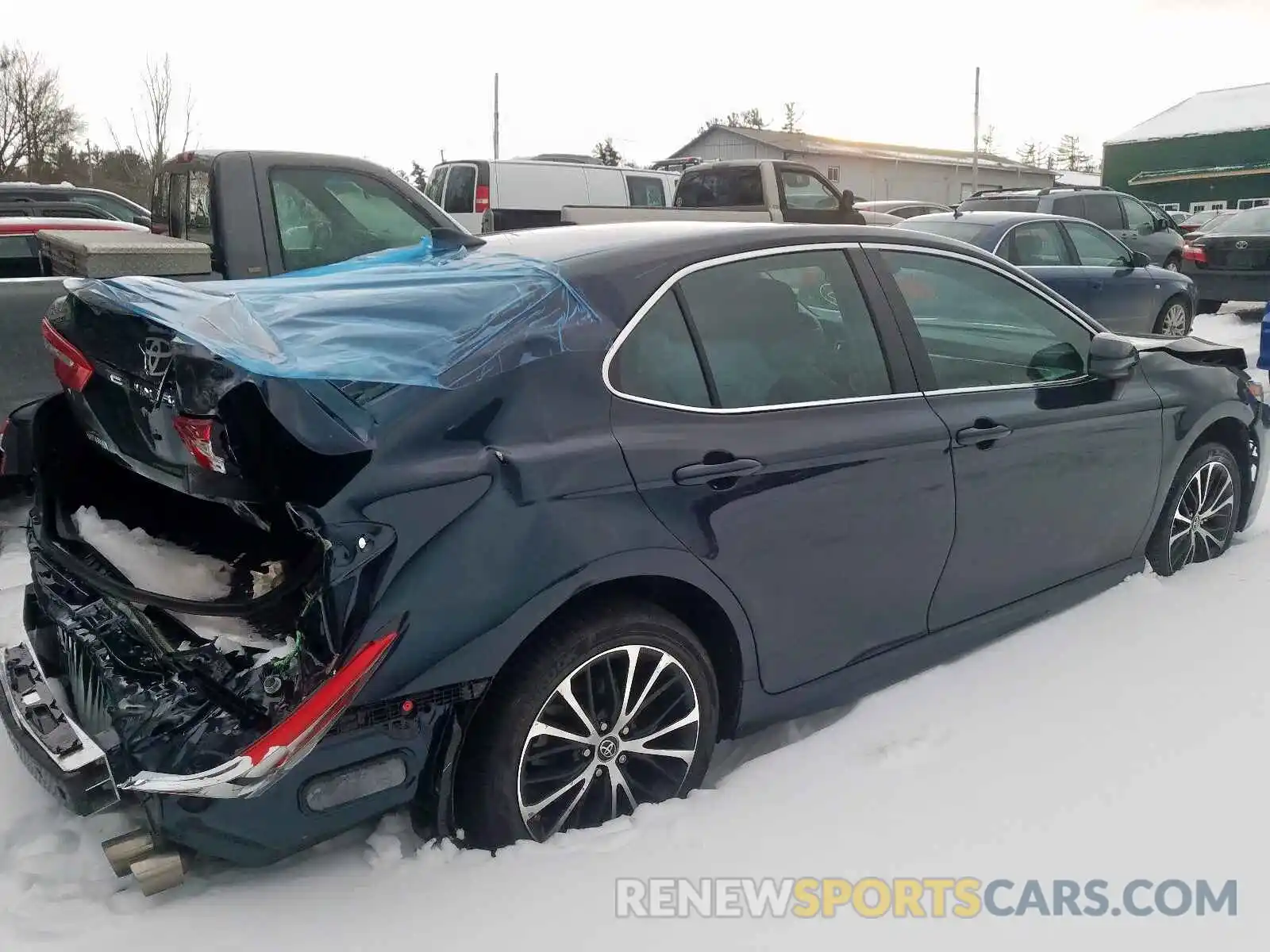 4 Photograph of a damaged car 4T1B11HK7KU729587 TOYOTA CAMRY 2019