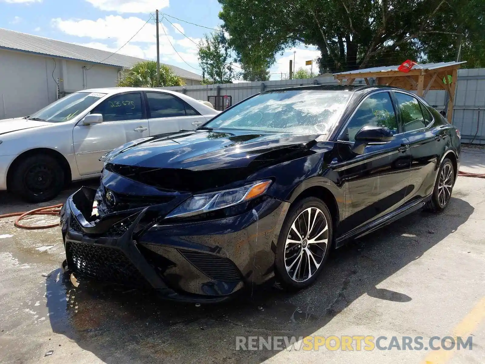 2 Photograph of a damaged car 4T1B11HK7KU730304 TOYOTA CAMRY 2019