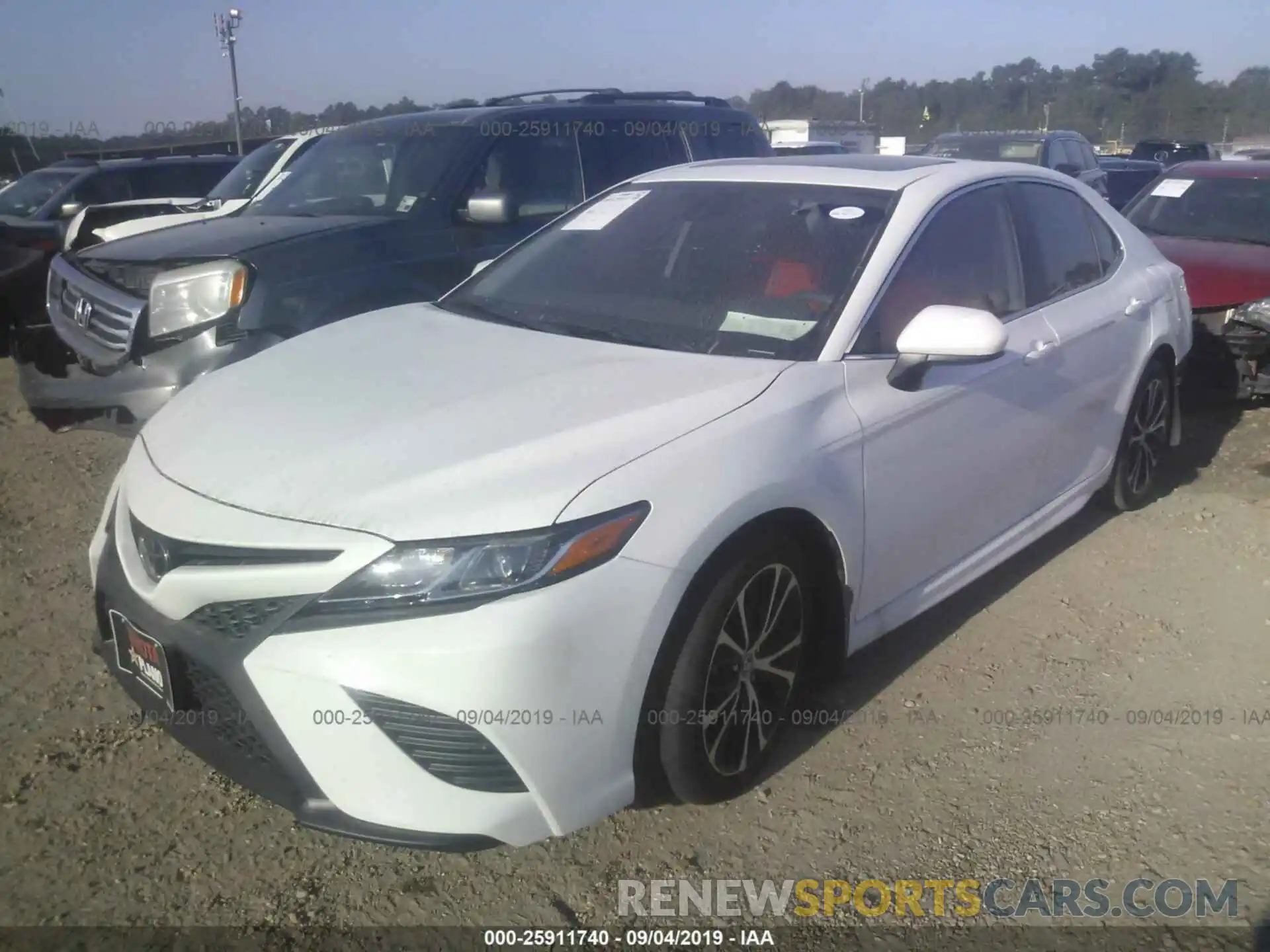 2 Photograph of a damaged car 4T1B11HK7KU731095 TOYOTA CAMRY 2019