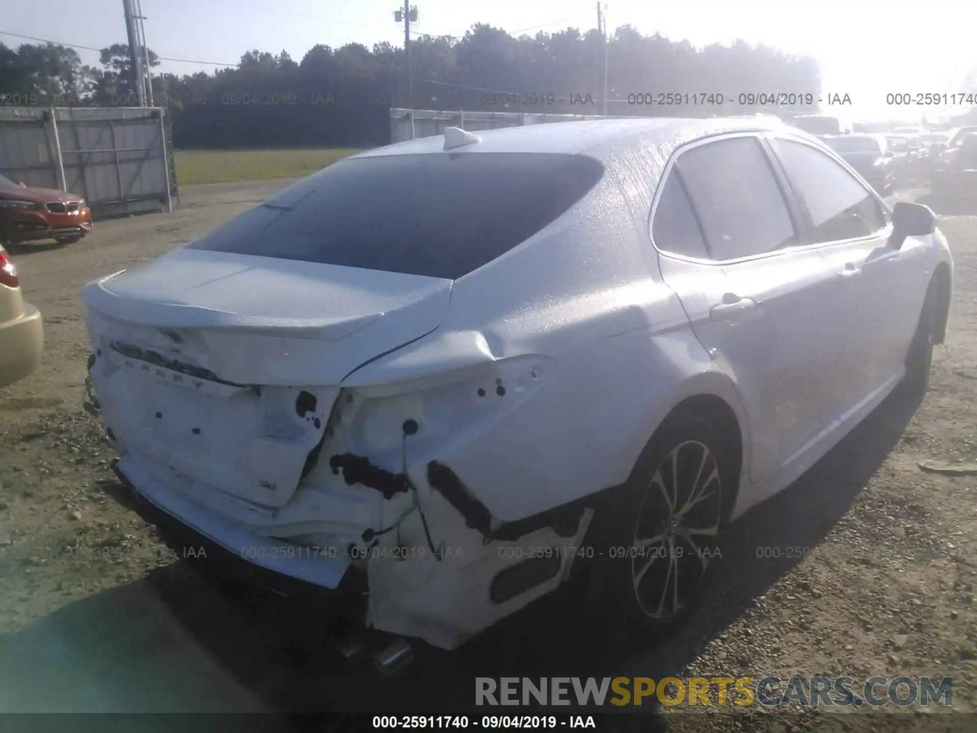 4 Photograph of a damaged car 4T1B11HK7KU731095 TOYOTA CAMRY 2019