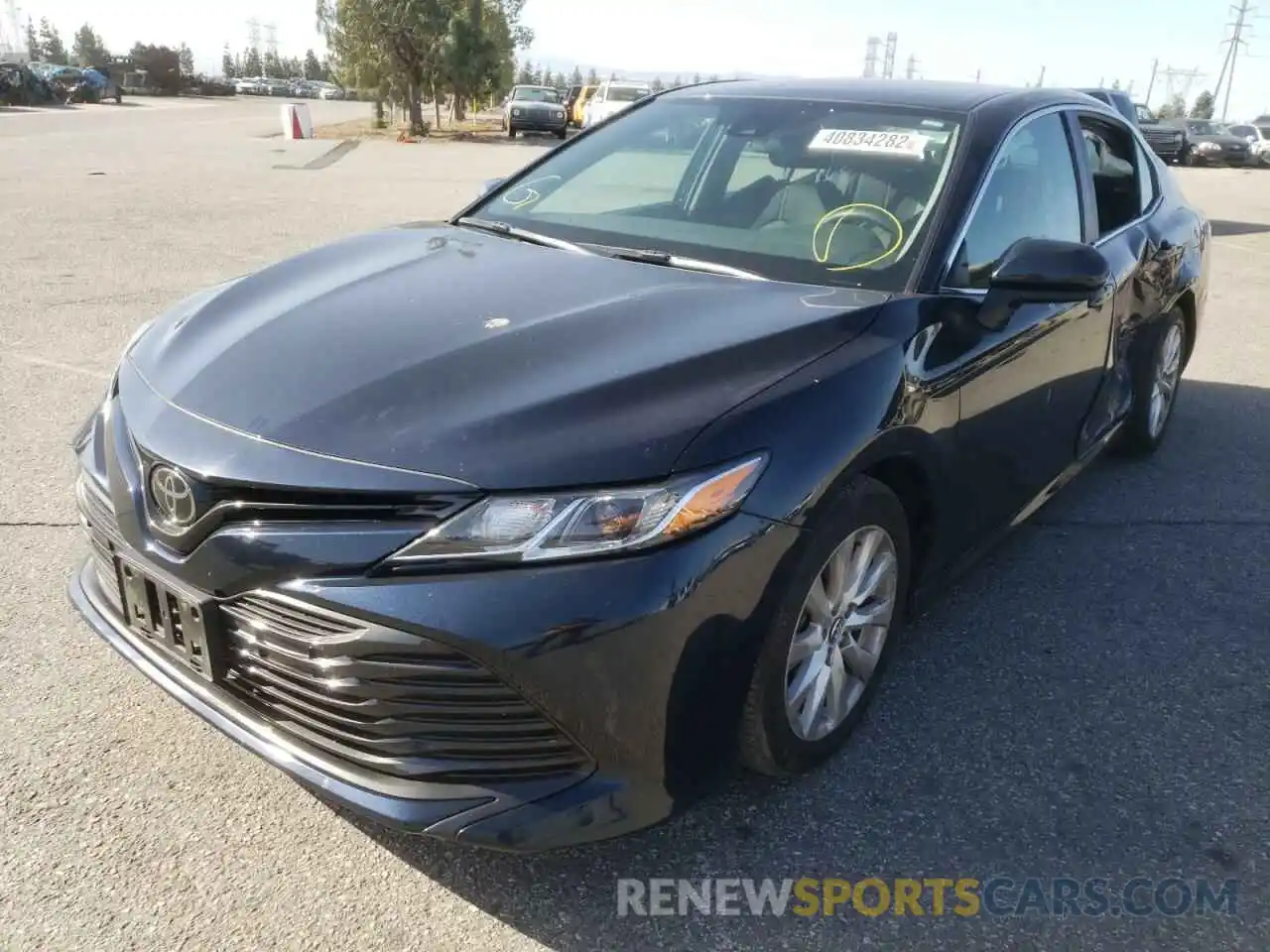 2 Photograph of a damaged car 4T1B11HK7KU736572 TOYOTA CAMRY 2019