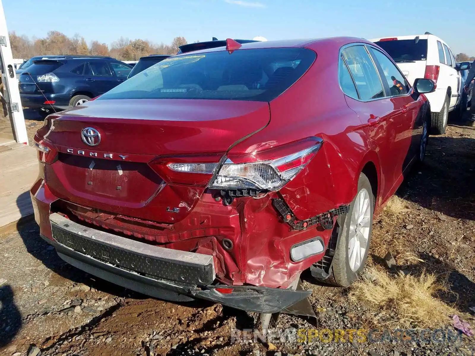 4 Photograph of a damaged car 4T1B11HK7KU741898 TOYOTA CAMRY 2019