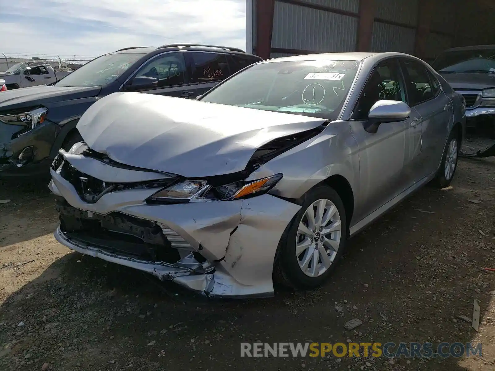 2 Photograph of a damaged car 4T1B11HK7KU742551 TOYOTA CAMRY 2019