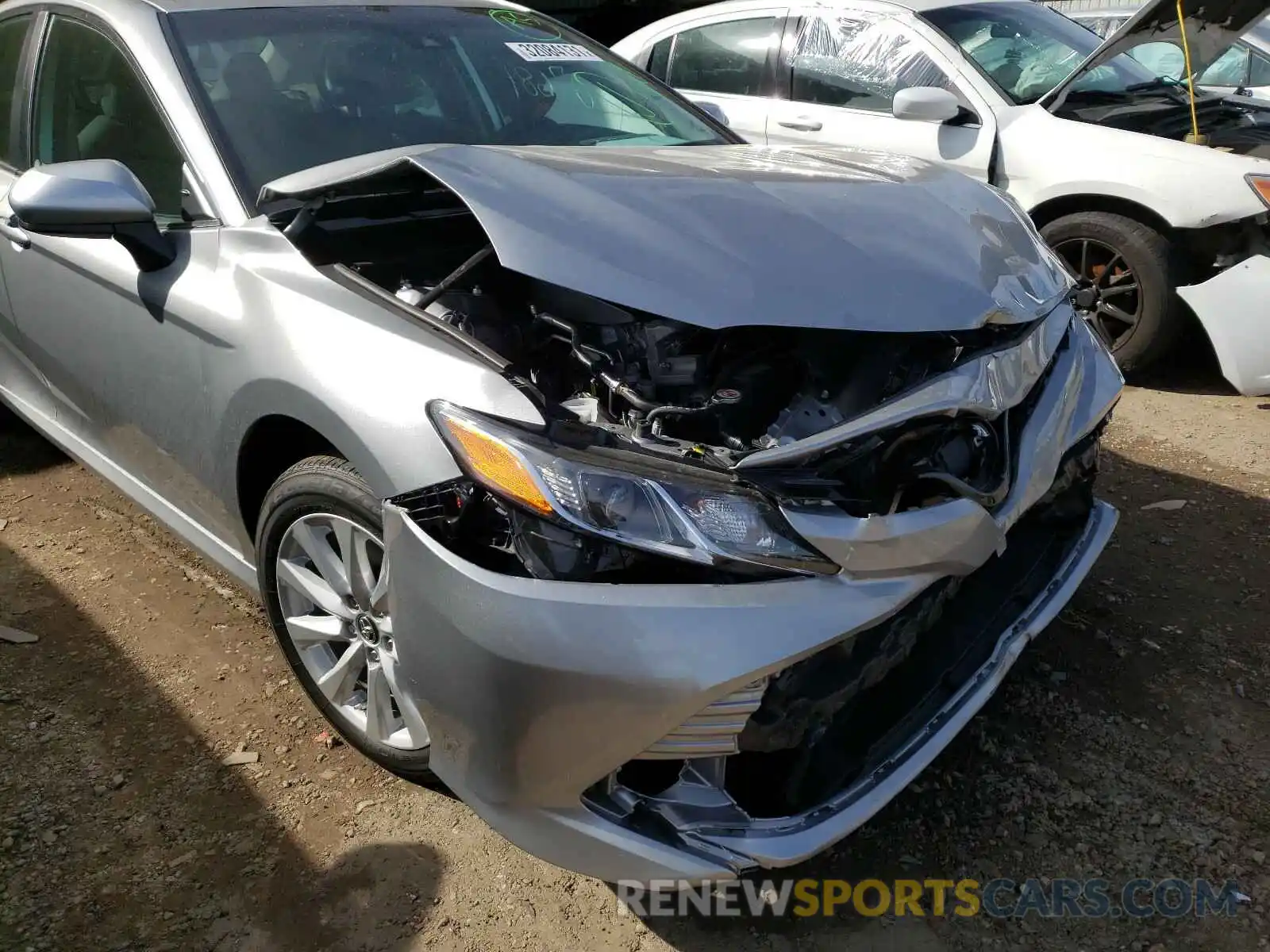 9 Photograph of a damaged car 4T1B11HK7KU742551 TOYOTA CAMRY 2019