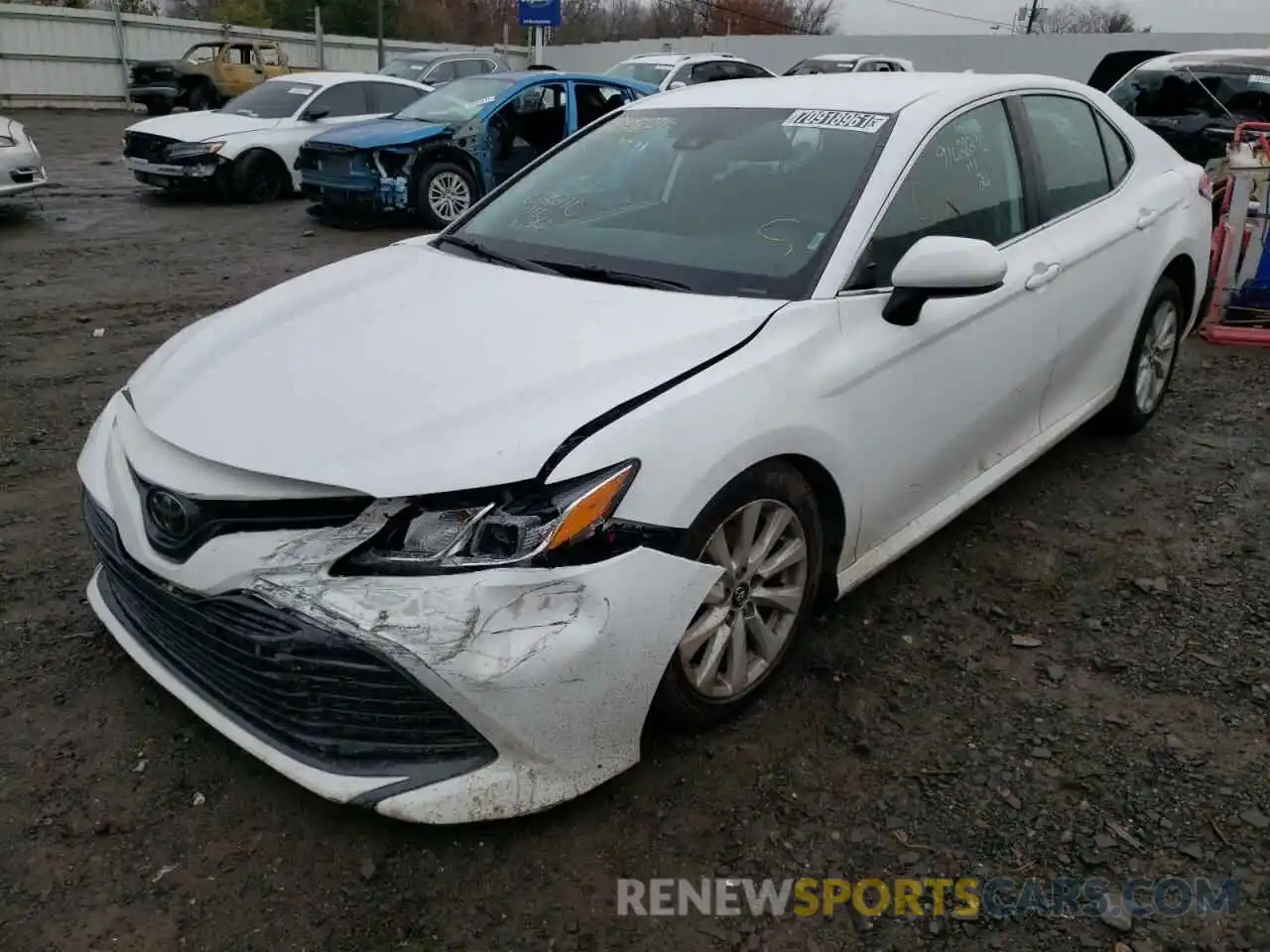 2 Photograph of a damaged car 4T1B11HK7KU744011 TOYOTA CAMRY 2019