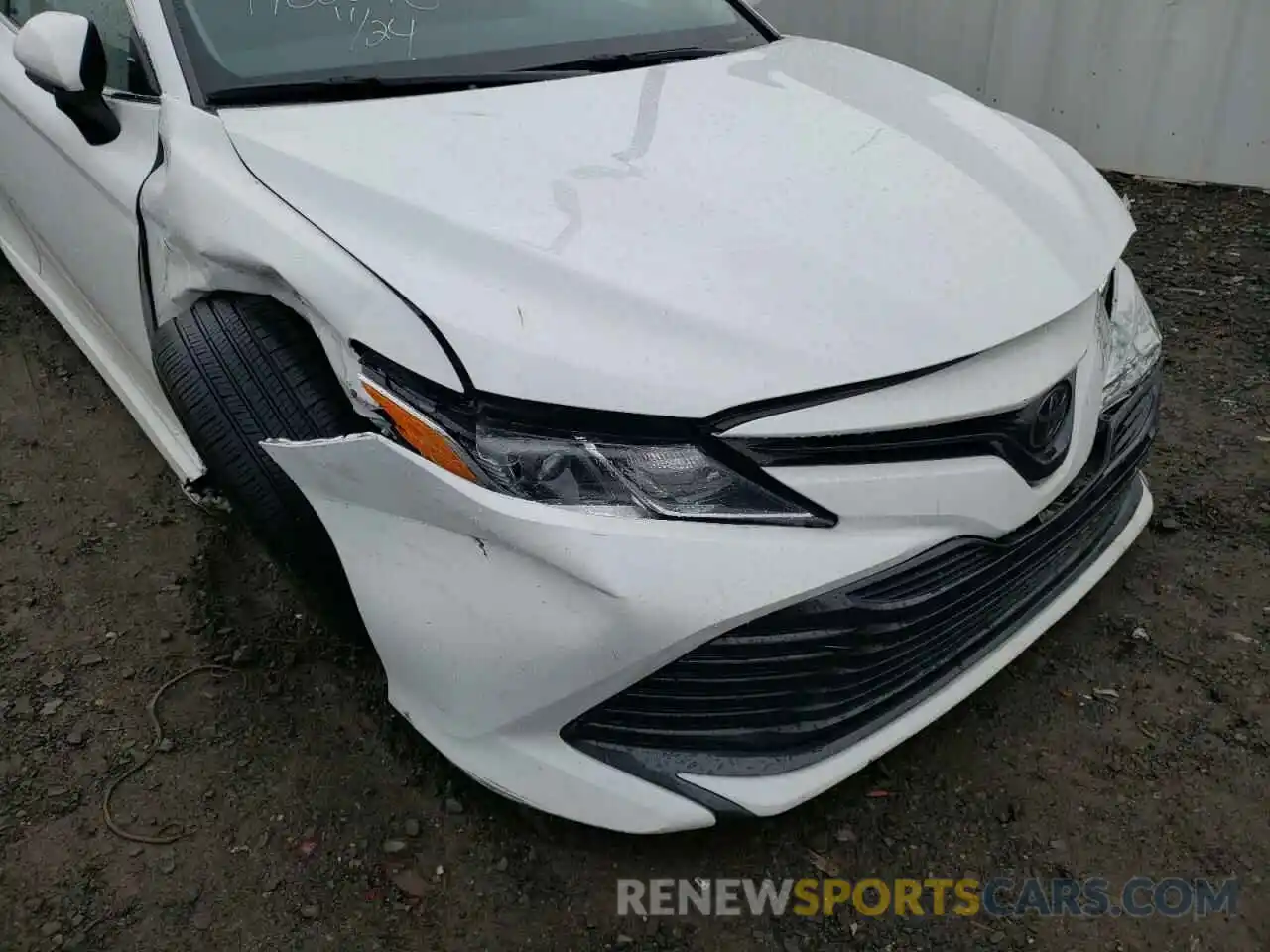 9 Photograph of a damaged car 4T1B11HK7KU744011 TOYOTA CAMRY 2019