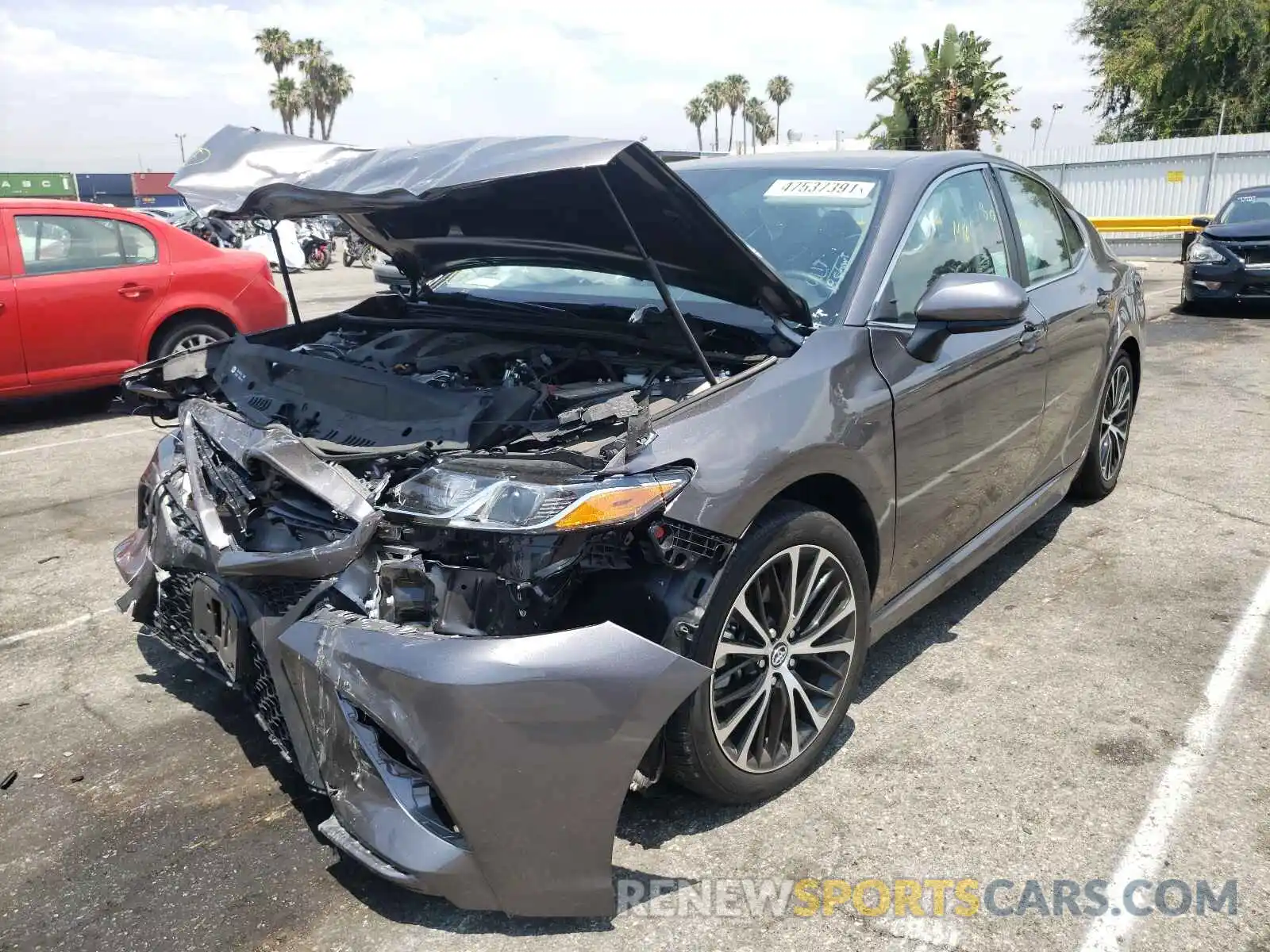 2 Photograph of a damaged car 4T1B11HK7KU744302 TOYOTA CAMRY 2019