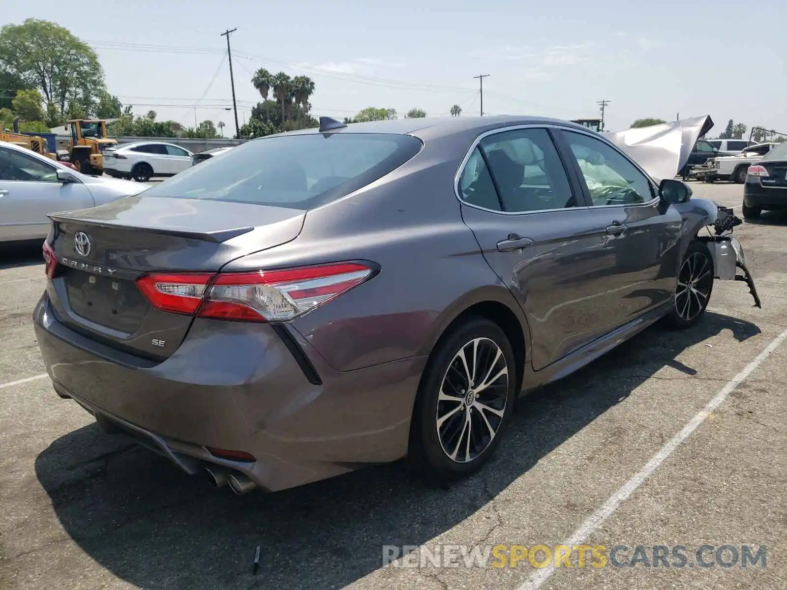 4 Photograph of a damaged car 4T1B11HK7KU744302 TOYOTA CAMRY 2019