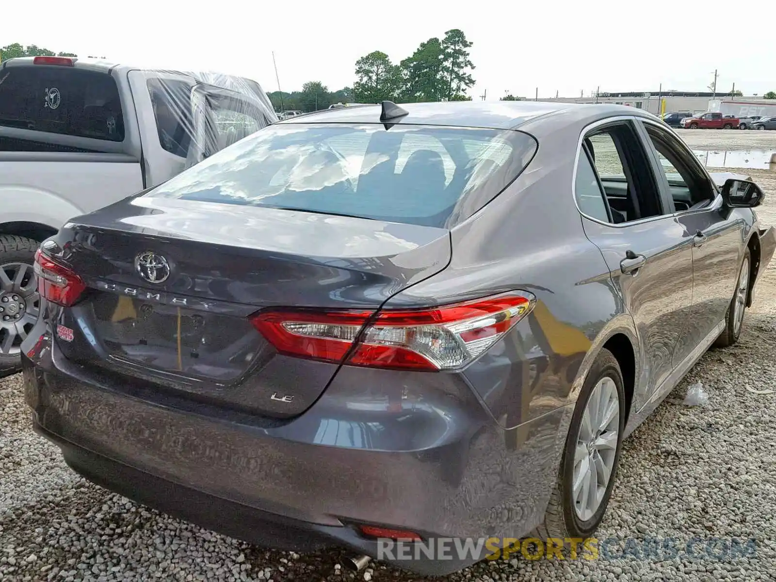 4 Photograph of a damaged car 4T1B11HK7KU747703 TOYOTA CAMRY 2019