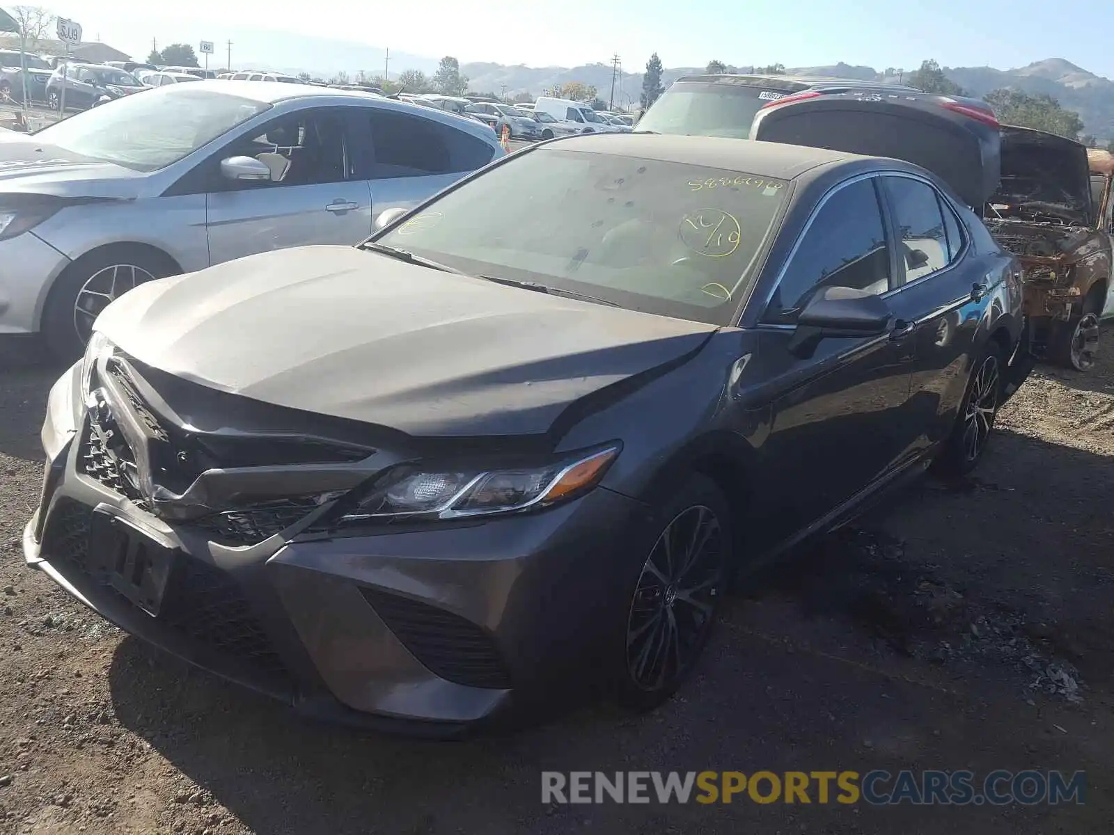 2 Photograph of a damaged car 4T1B11HK7KU747880 TOYOTA CAMRY 2019