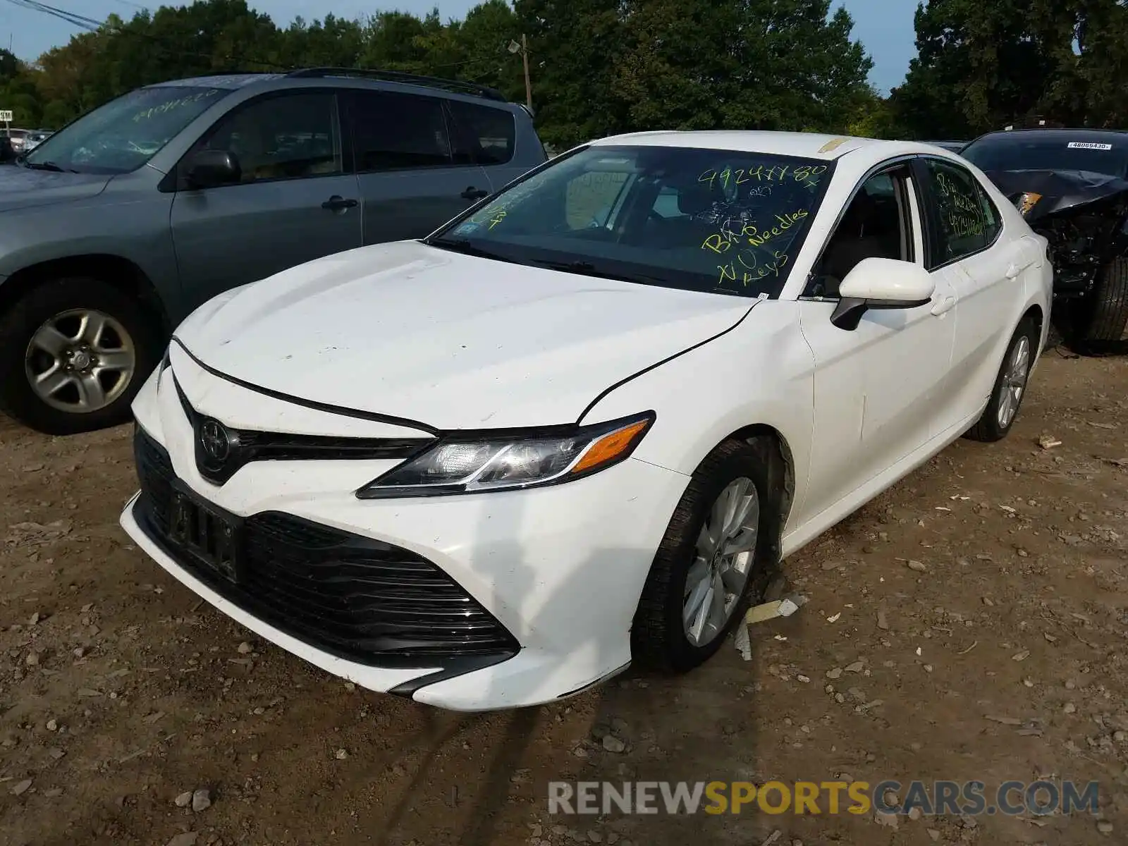 2 Photograph of a damaged car 4T1B11HK7KU753436 TOYOTA CAMRY 2019