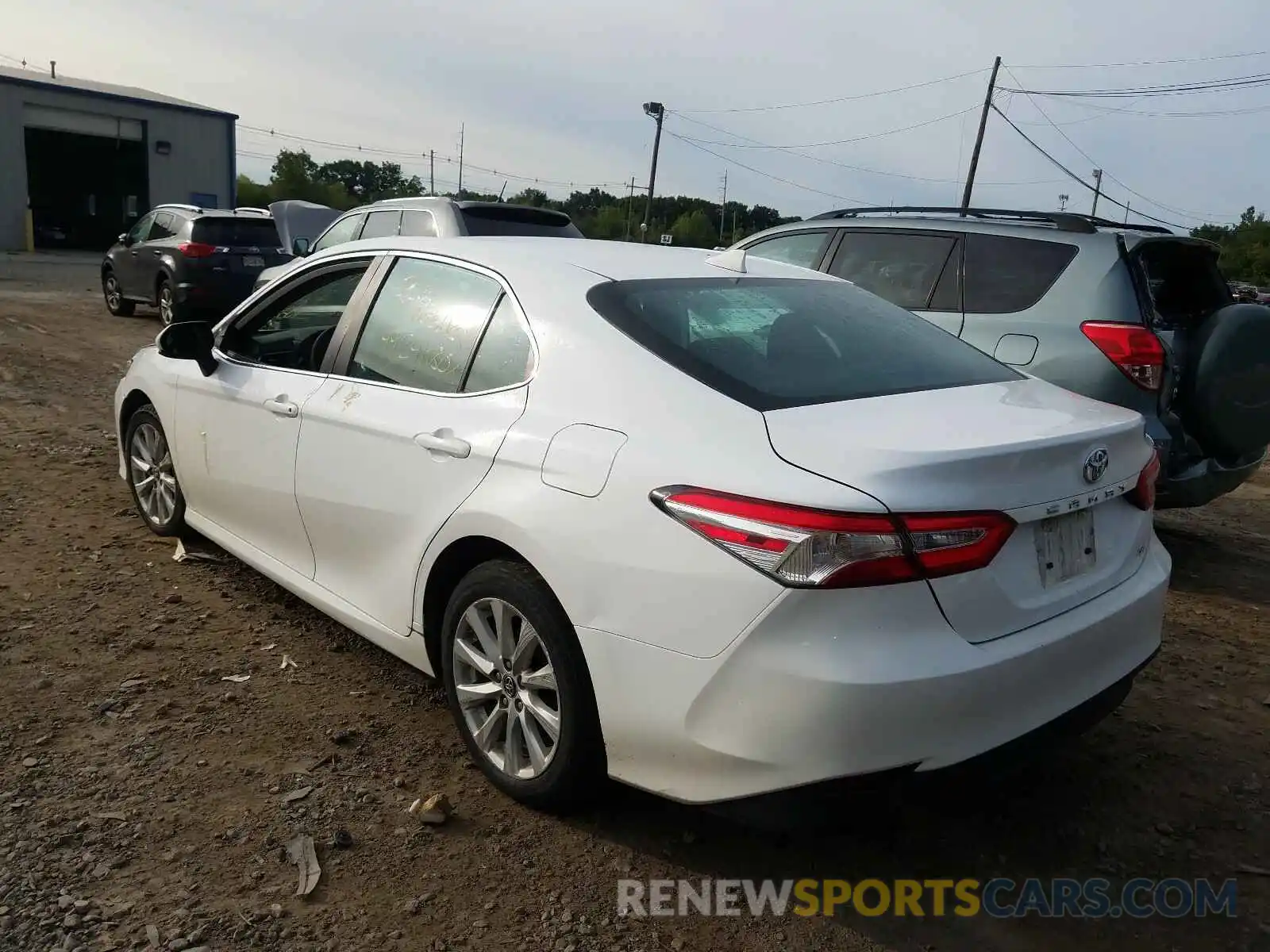 3 Photograph of a damaged car 4T1B11HK7KU753436 TOYOTA CAMRY 2019