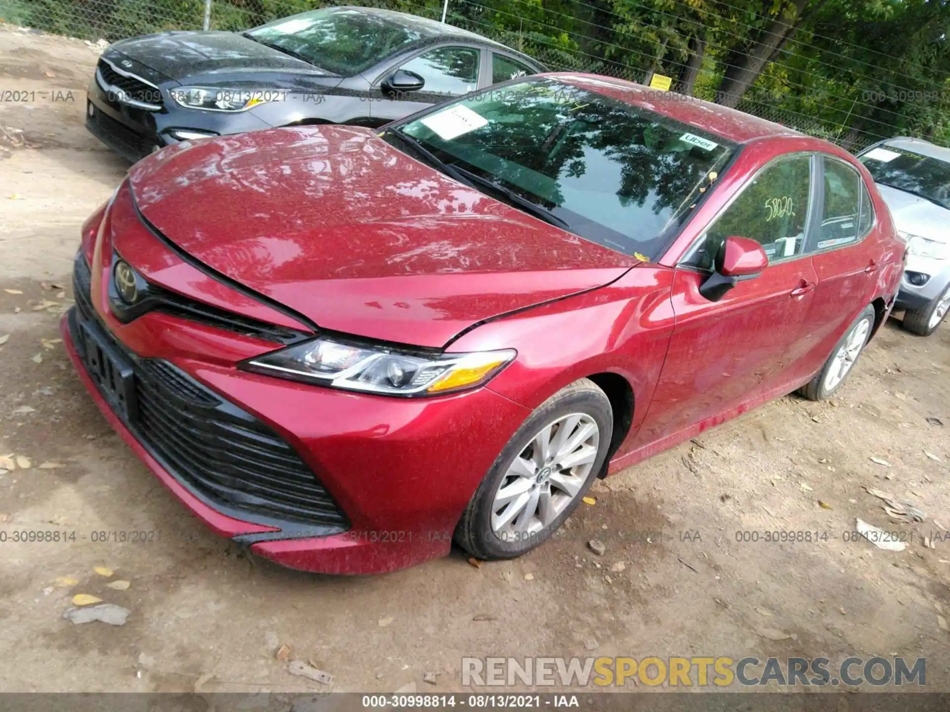 2 Photograph of a damaged car 4T1B11HK7KU753677 TOYOTA CAMRY 2019