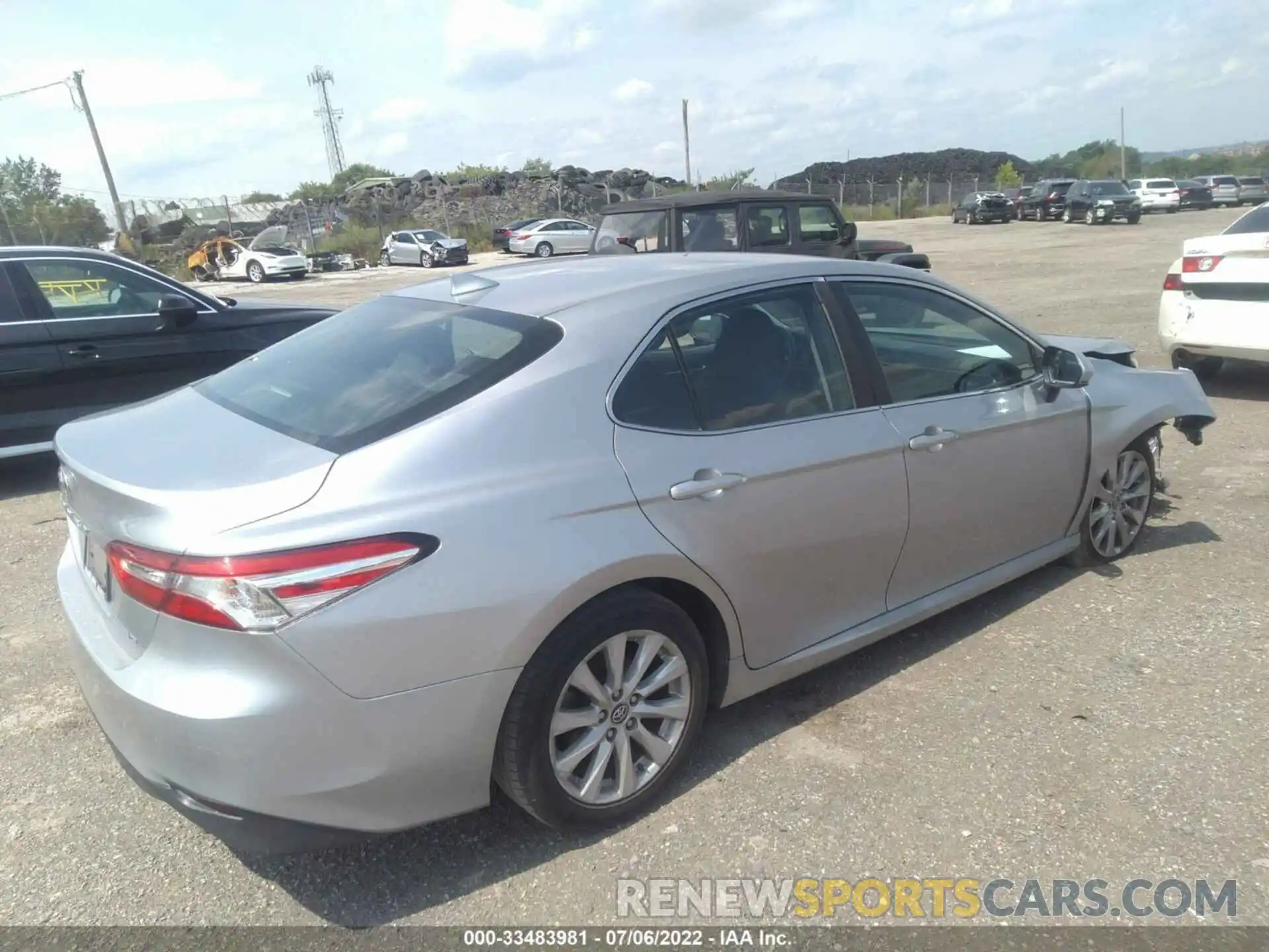 4 Photograph of a damaged car 4T1B11HK7KU753856 TOYOTA CAMRY 2019