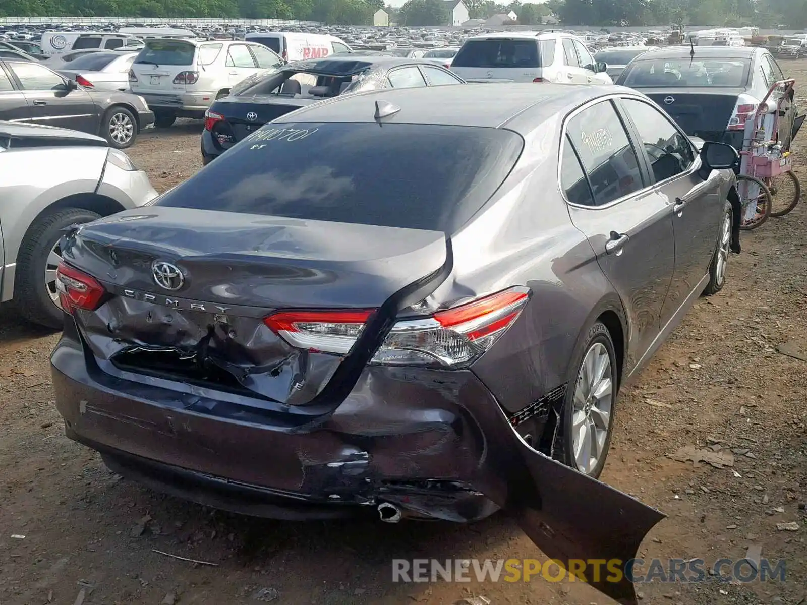 4 Photograph of a damaged car 4T1B11HK7KU756661 TOYOTA CAMRY 2019