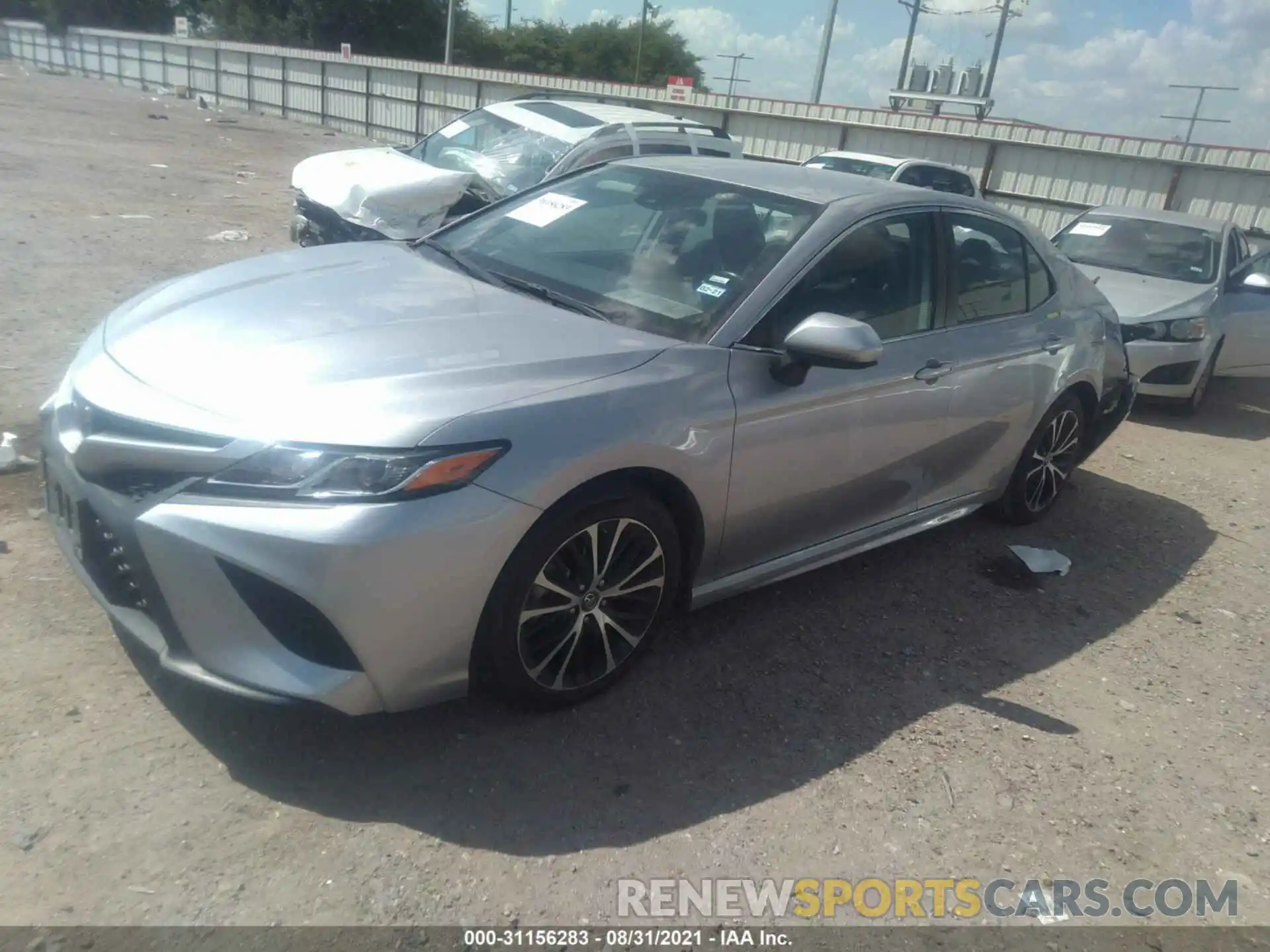 2 Photograph of a damaged car 4T1B11HK7KU756904 TOYOTA CAMRY 2019