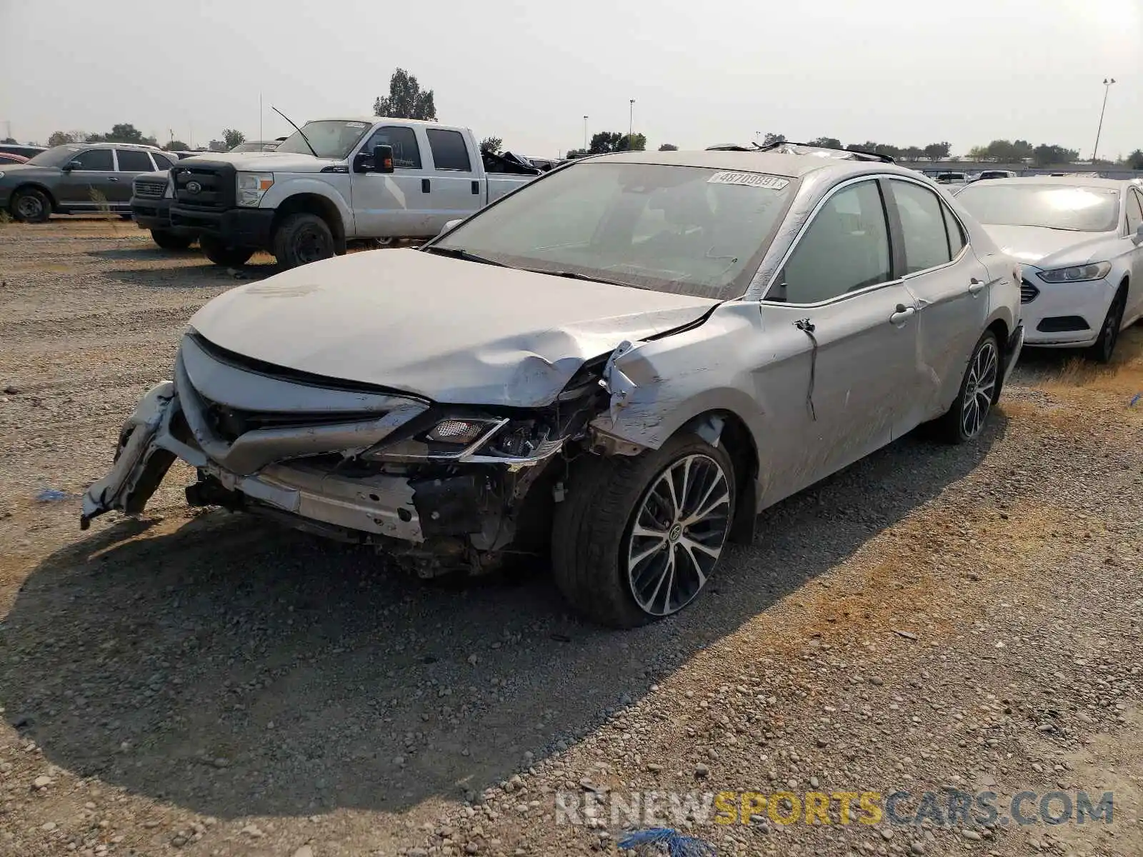 2 Photograph of a damaged car 4T1B11HK7KU757356 TOYOTA CAMRY 2019