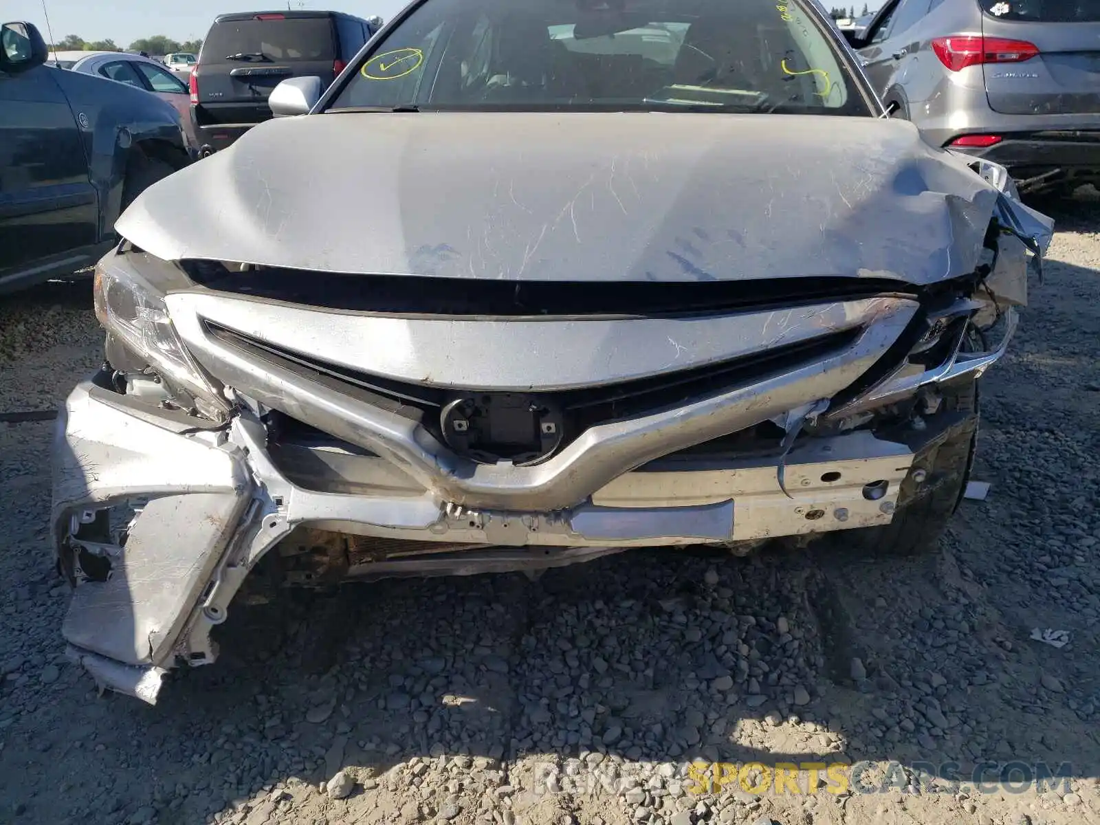 9 Photograph of a damaged car 4T1B11HK7KU757356 TOYOTA CAMRY 2019