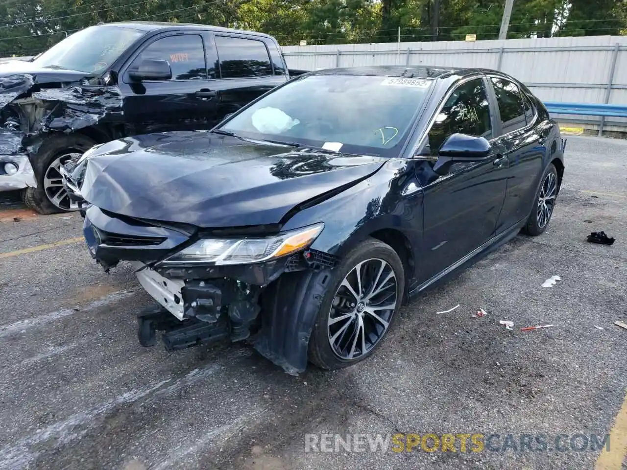 2 Photograph of a damaged car 4T1B11HK7KU758815 TOYOTA CAMRY 2019