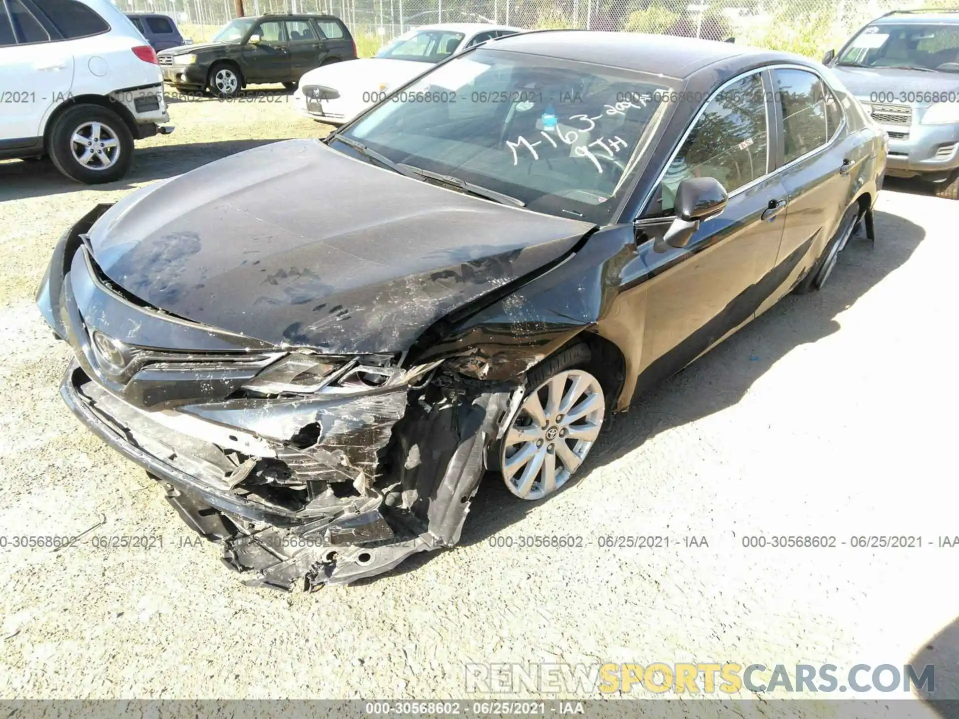 2 Photograph of a damaged car 4T1B11HK7KU763612 TOYOTA CAMRY 2019