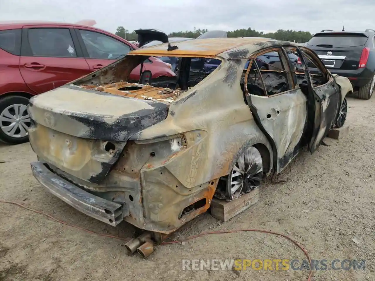 4 Photograph of a damaged car 4T1B11HK7KU767577 TOYOTA CAMRY 2019