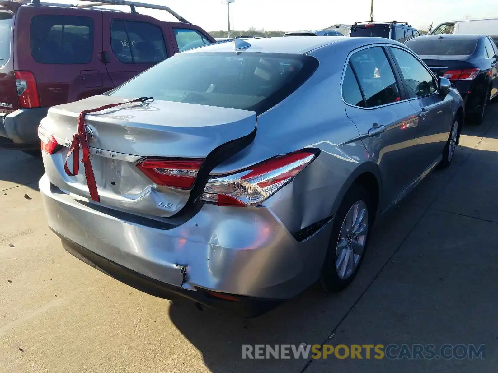 4 Photograph of a damaged car 4T1B11HK7KU769913 TOYOTA CAMRY 2019