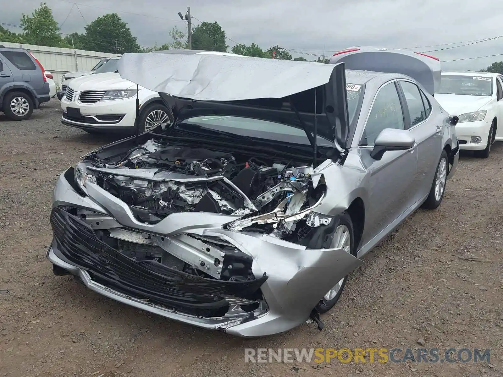 2 Photograph of a damaged car 4T1B11HK7KU771337 TOYOTA CAMRY 2019