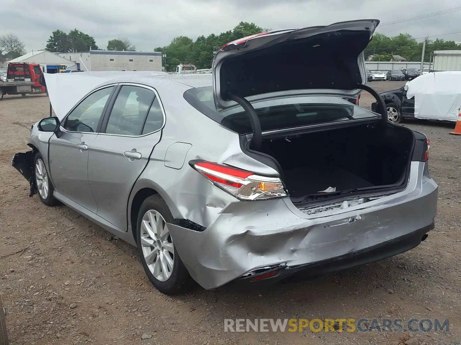 3 Photograph of a damaged car 4T1B11HK7KU771337 TOYOTA CAMRY 2019