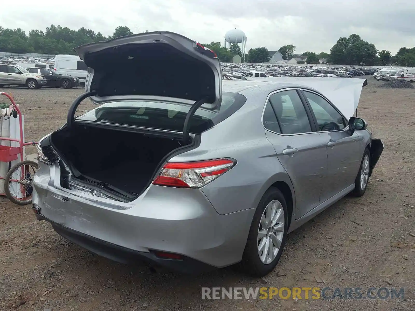 4 Photograph of a damaged car 4T1B11HK7KU771337 TOYOTA CAMRY 2019