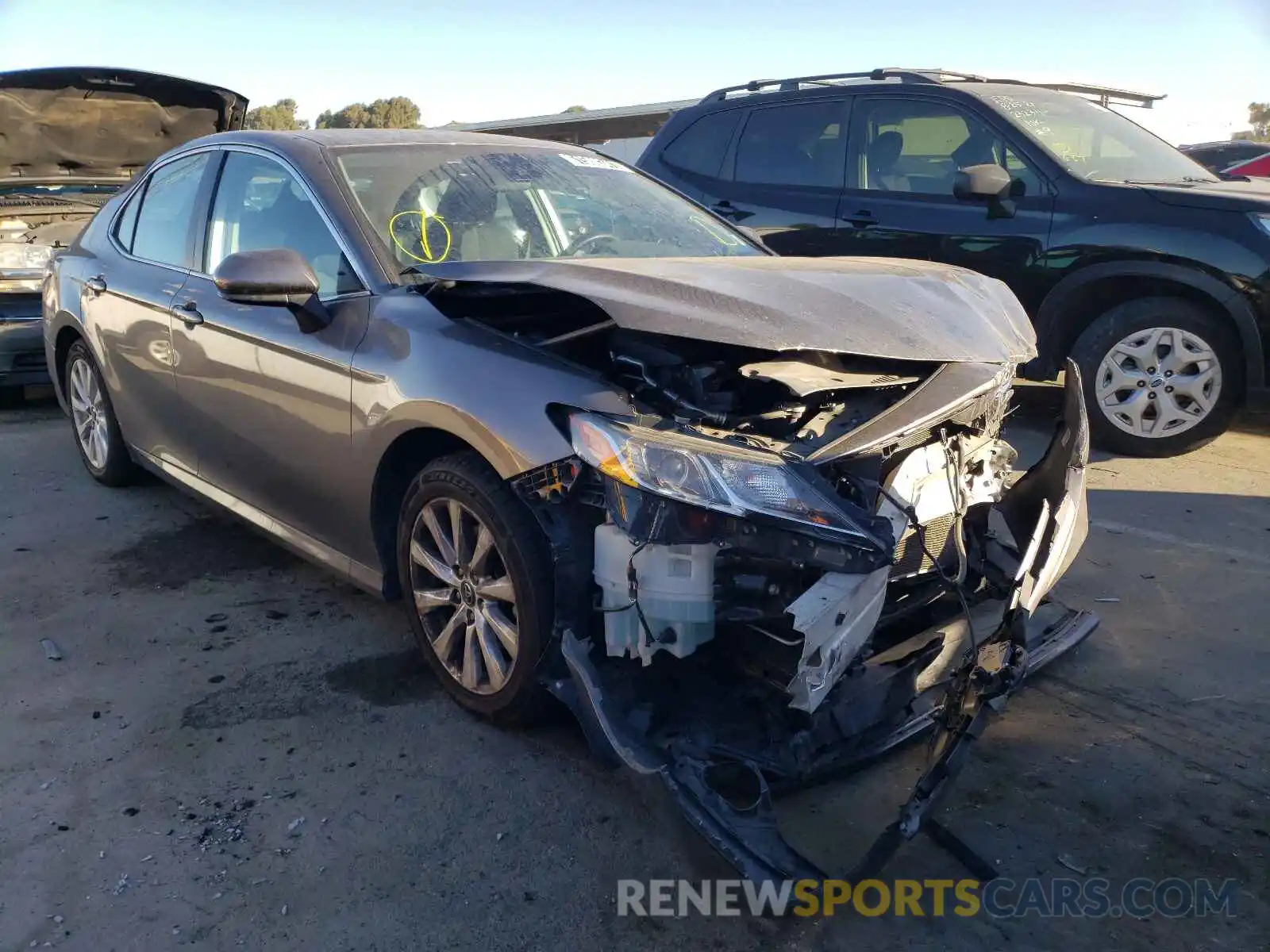 1 Photograph of a damaged car 4T1B11HK7KU771595 TOYOTA CAMRY 2019