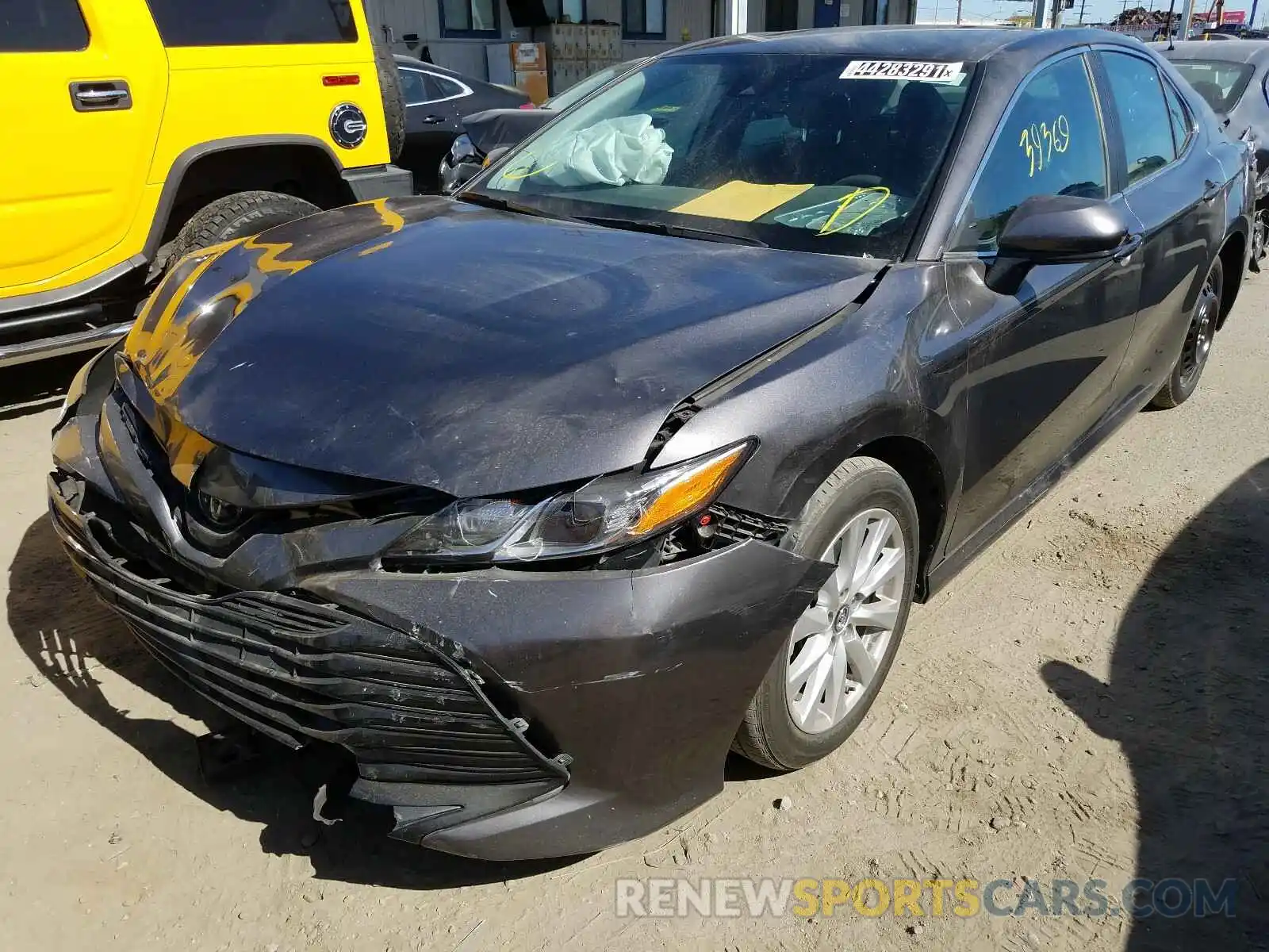 2 Photograph of a damaged car 4T1B11HK7KU772892 TOYOTA CAMRY 2019