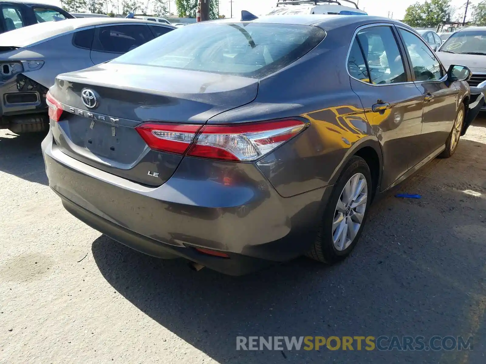 4 Photograph of a damaged car 4T1B11HK7KU772892 TOYOTA CAMRY 2019