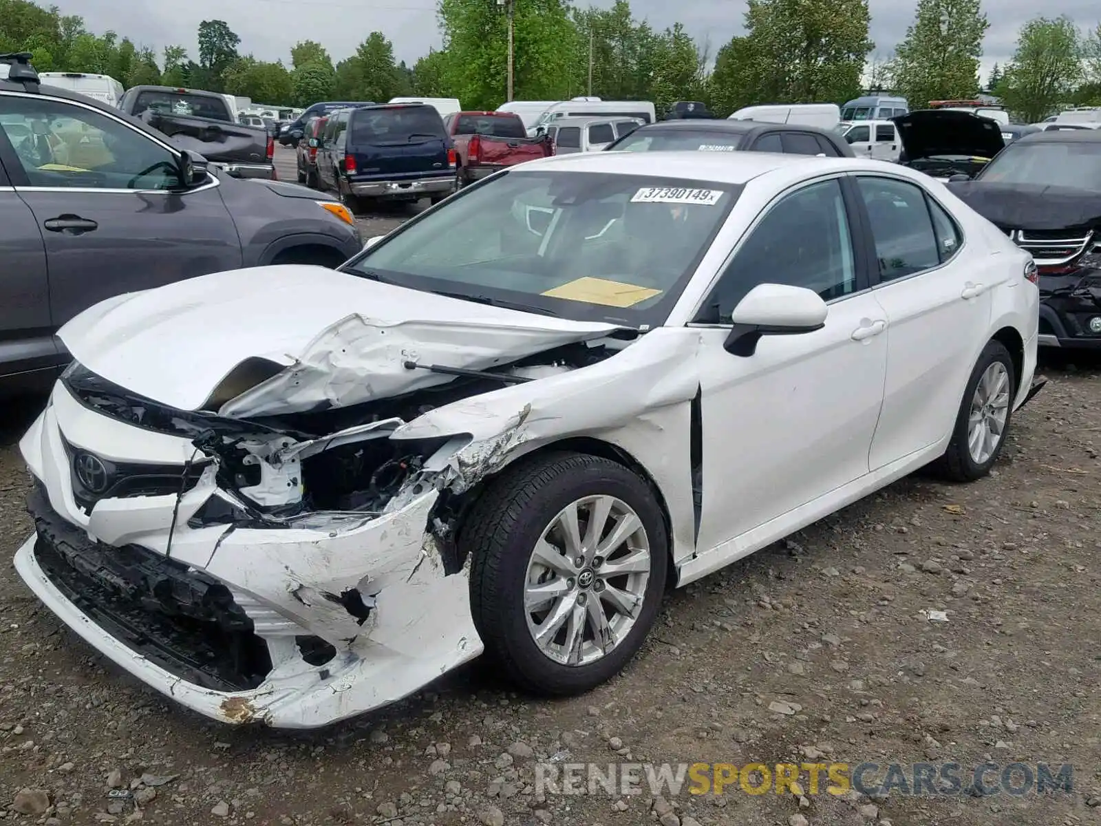 2 Photograph of a damaged car 4T1B11HK7KU773153 TOYOTA CAMRY 2019