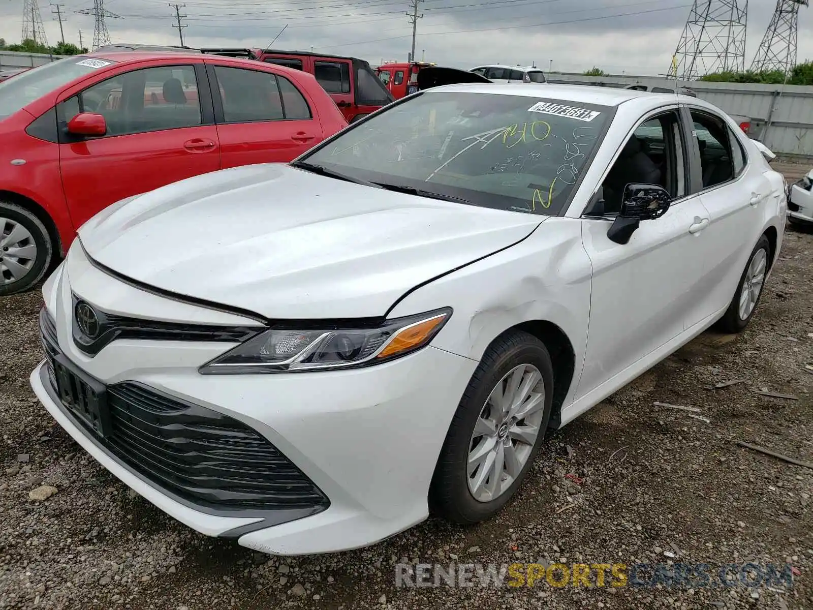 2 Photograph of a damaged car 4T1B11HK7KU773976 TOYOTA CAMRY 2019