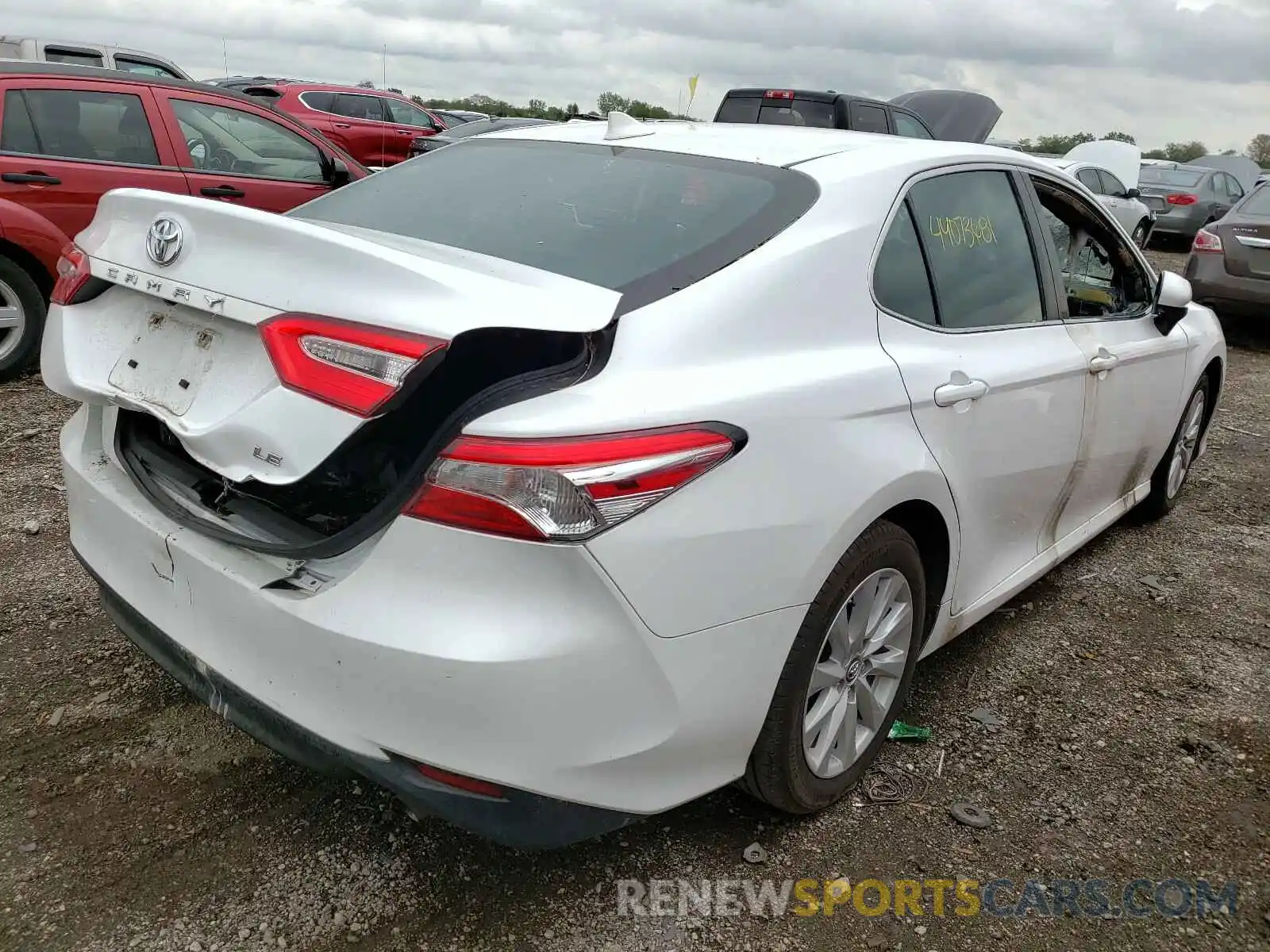 4 Photograph of a damaged car 4T1B11HK7KU773976 TOYOTA CAMRY 2019