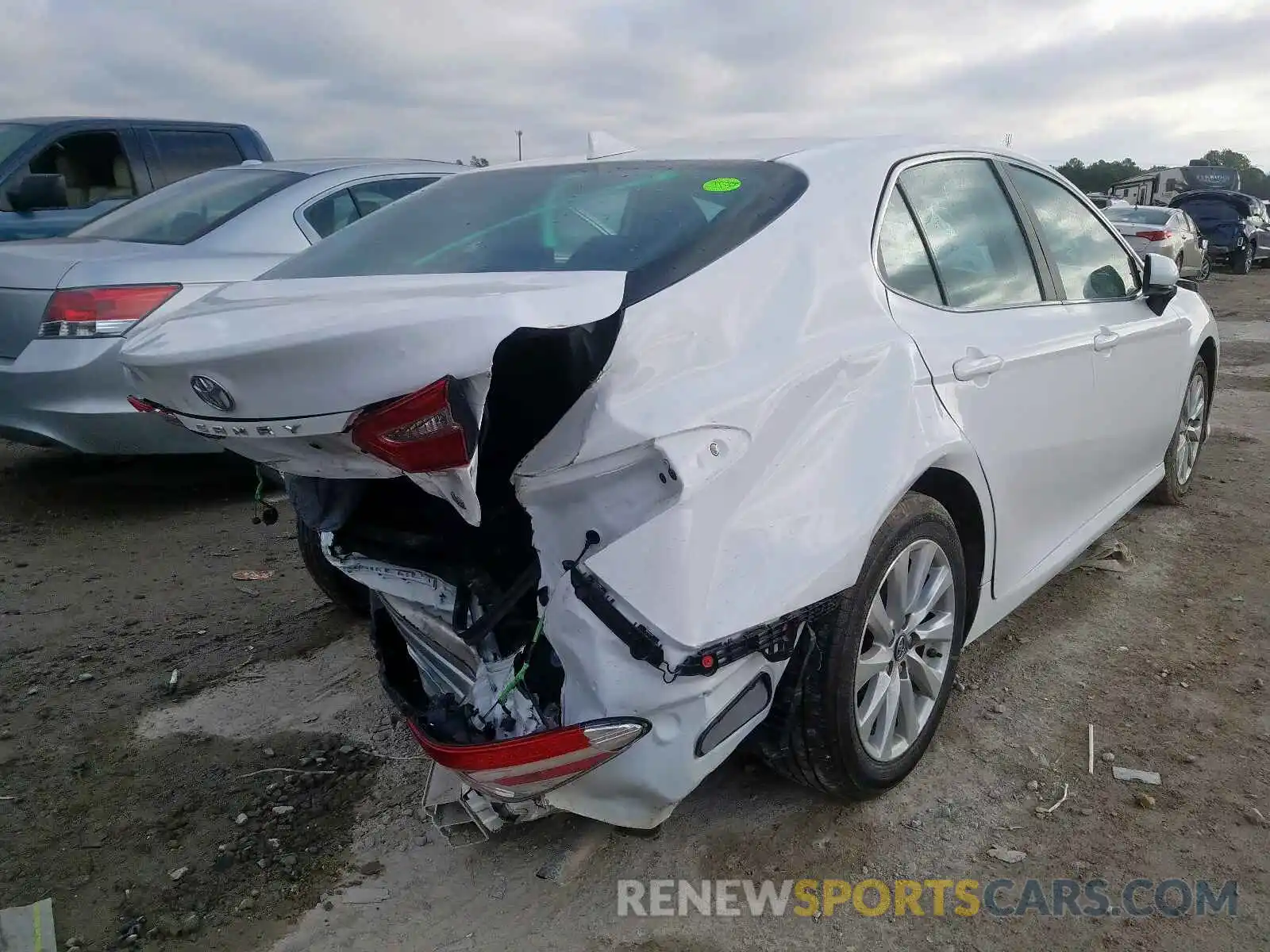 4 Photograph of a damaged car 4T1B11HK7KU774271 TOYOTA CAMRY 2019