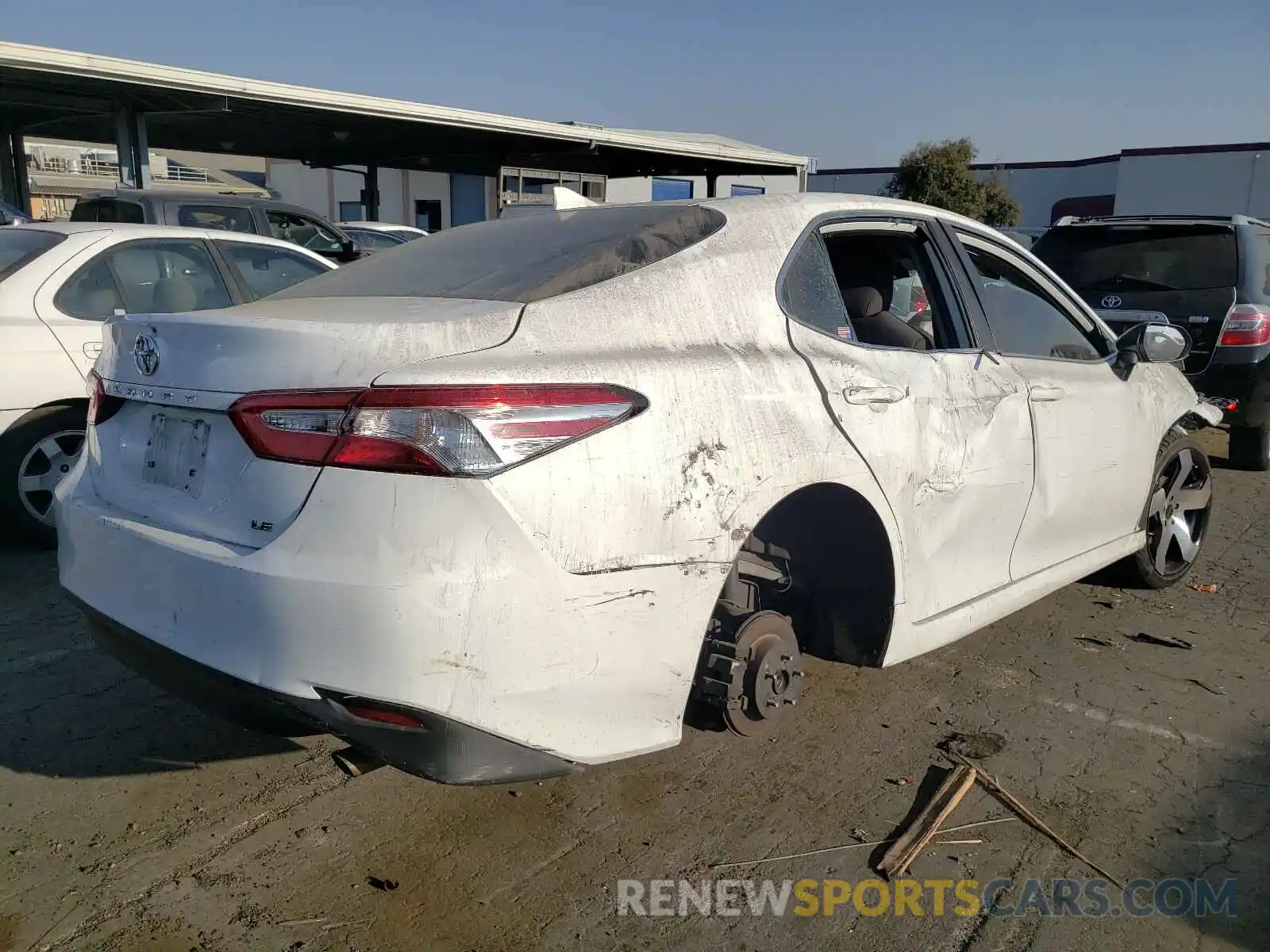 4 Photograph of a damaged car 4T1B11HK7KU774738 TOYOTA CAMRY 2019