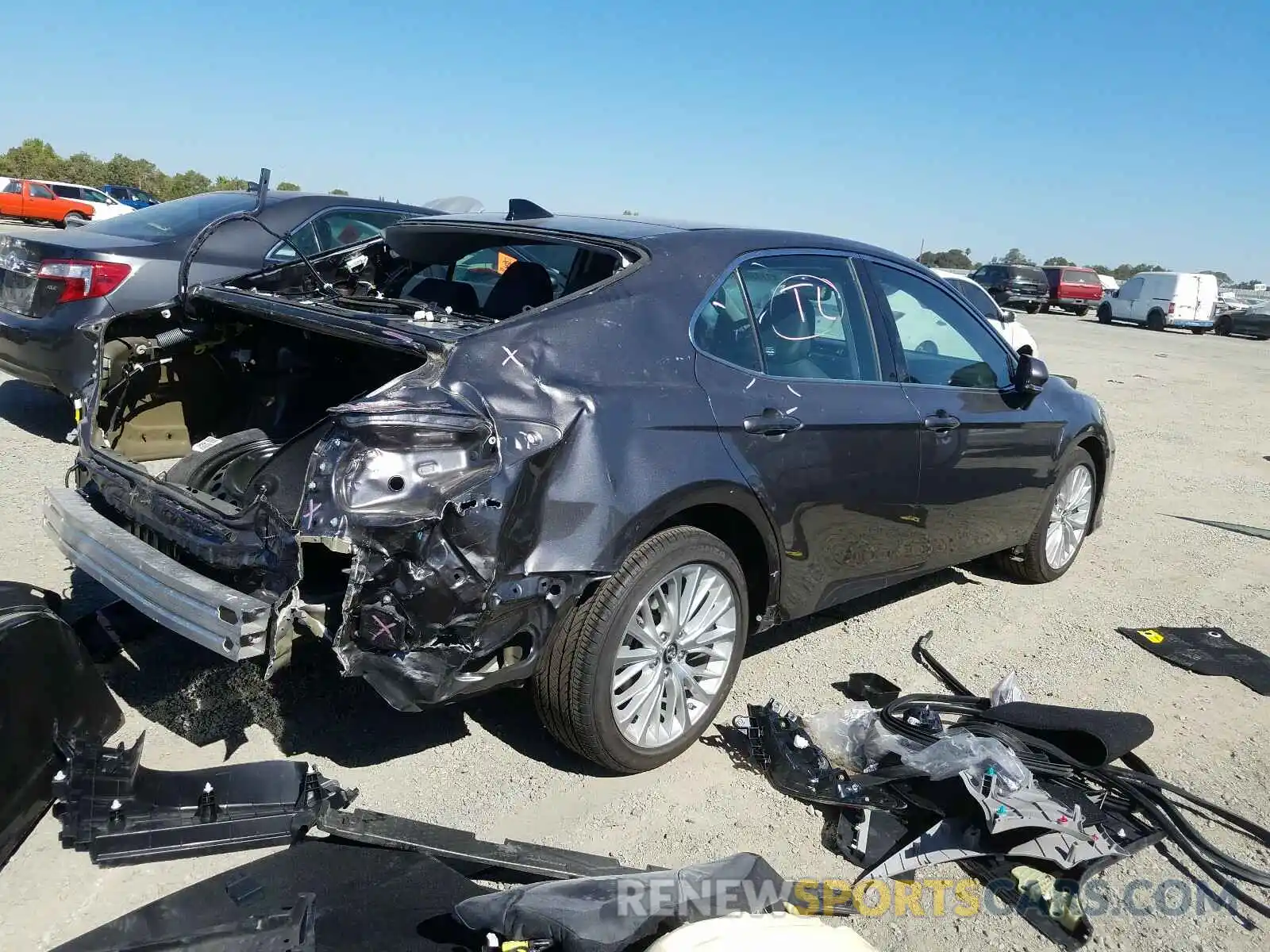 4 Photograph of a damaged car 4T1B11HK7KU779499 TOYOTA CAMRY 2019