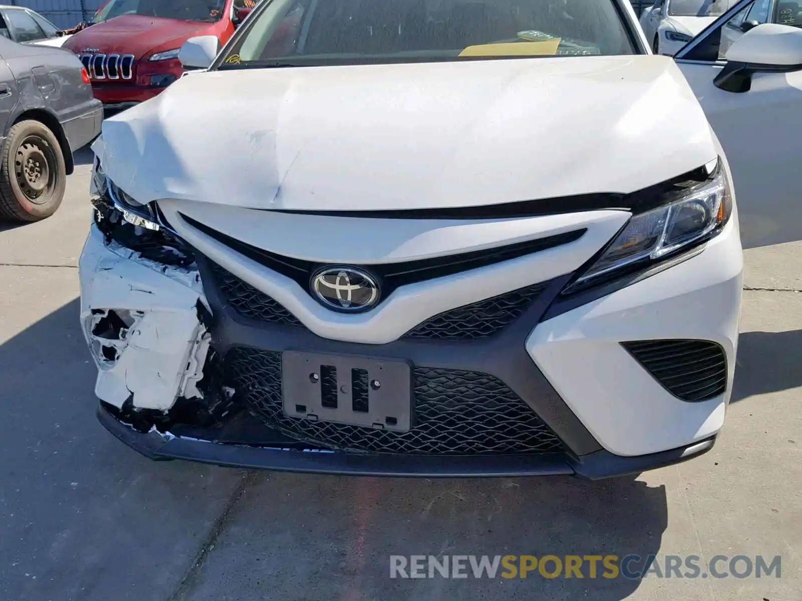 7 Photograph of a damaged car 4T1B11HK7KU779759 TOYOTA CAMRY 2019