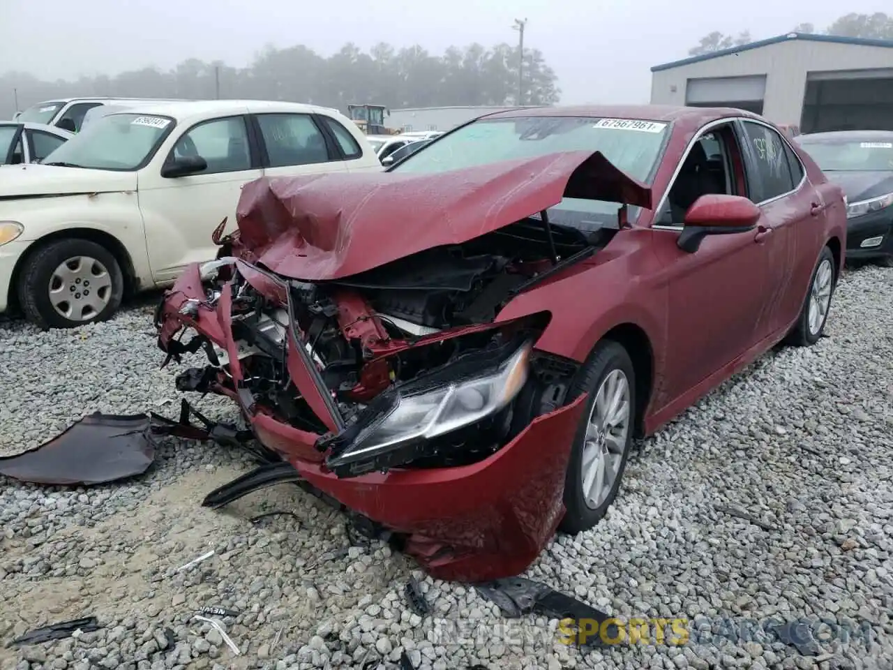 2 Photograph of a damaged car 4T1B11HK7KU781639 TOYOTA CAMRY 2019