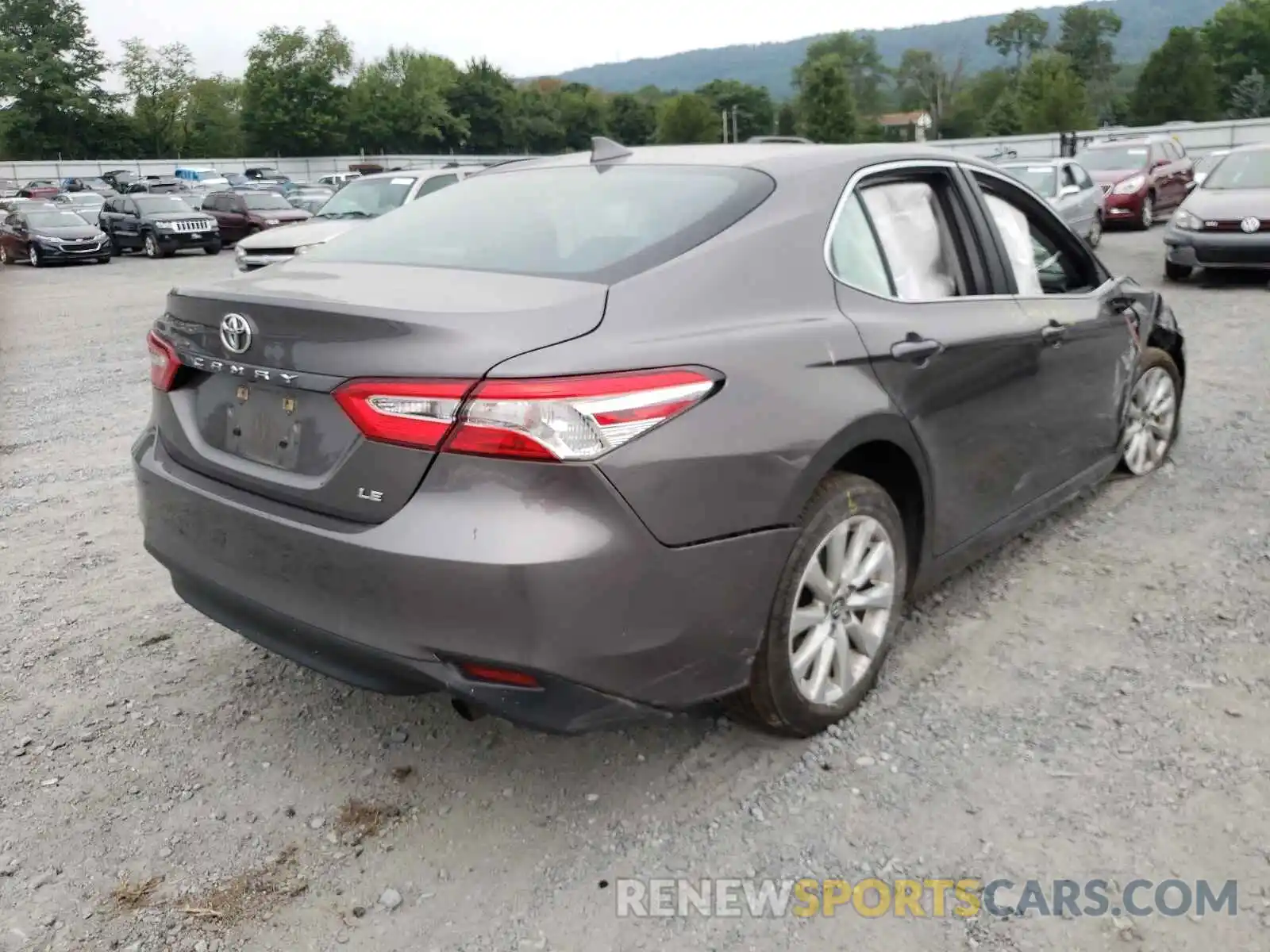 4 Photograph of a damaged car 4T1B11HK7KU783990 TOYOTA CAMRY 2019