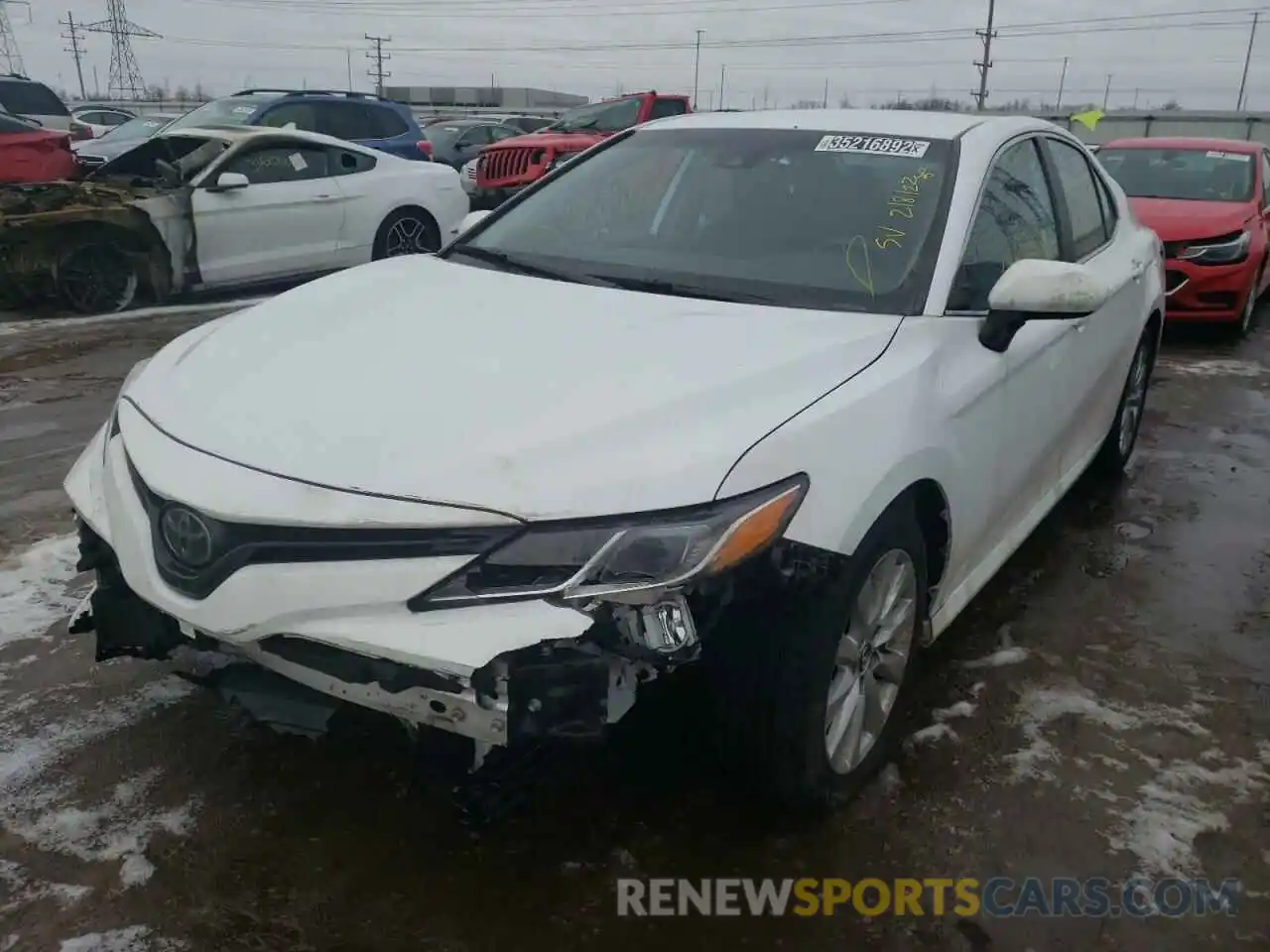 2 Photograph of a damaged car 4T1B11HK7KU784332 TOYOTA CAMRY 2019